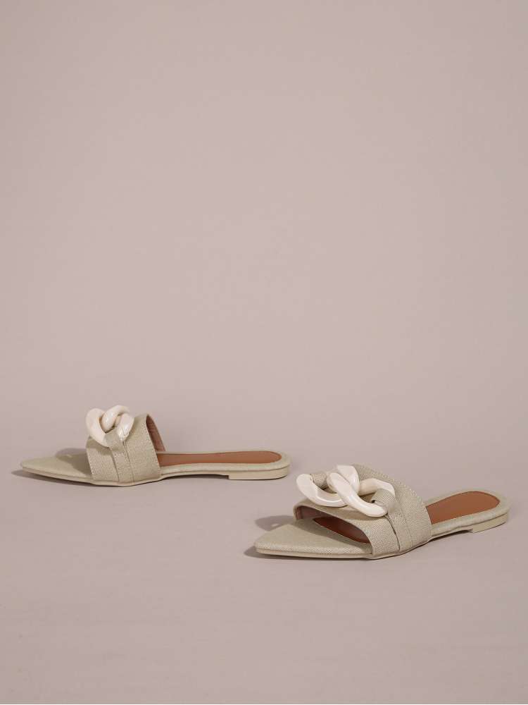 Wholesale7 acrylic pointed toe slippers in beige with white chain detail and flat sole