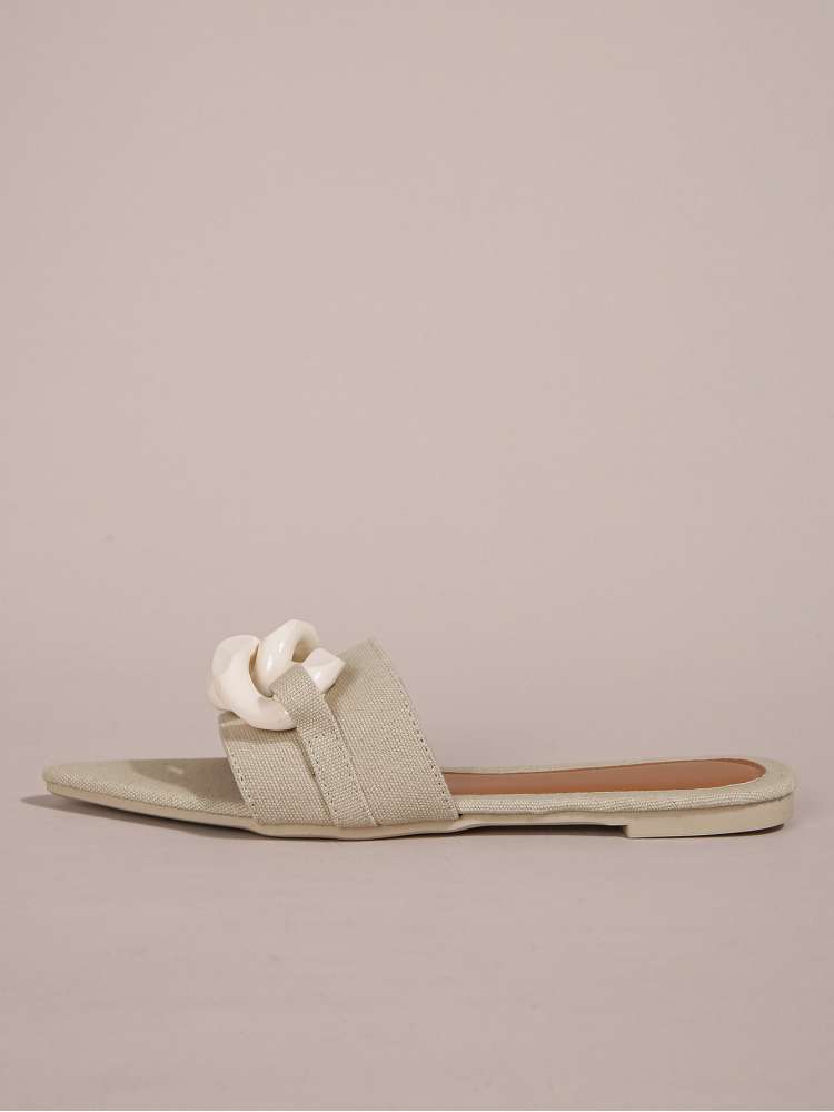 Wholesale7 beige acrylic pointed toe slippers with chain detail and flat sole