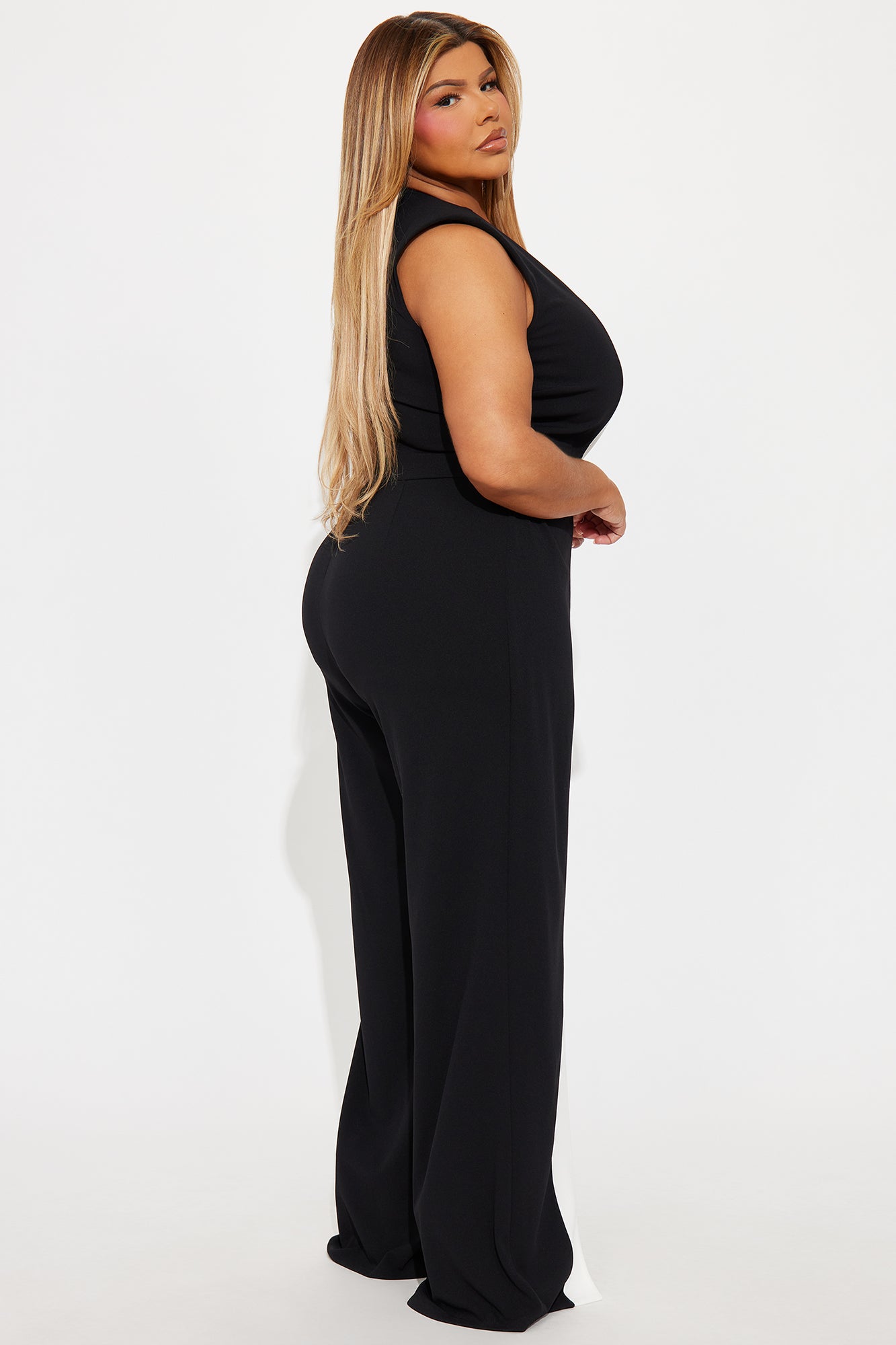 Chic black and white crepe jumpsuit ideal for stylish outings and special occasions