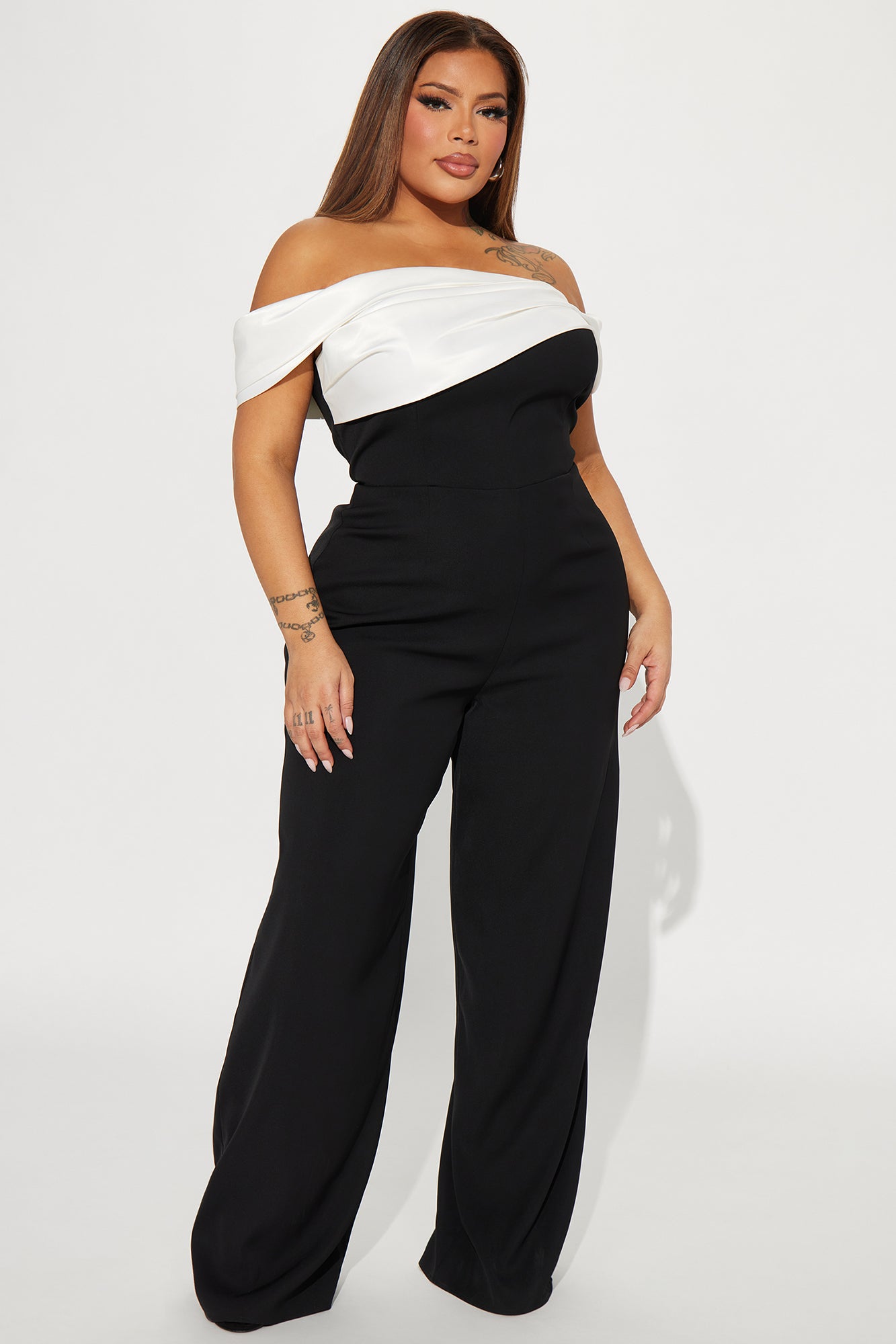 Fashion Nova black and white jumpsuit for women with off-shoulder design and wide-leg fit