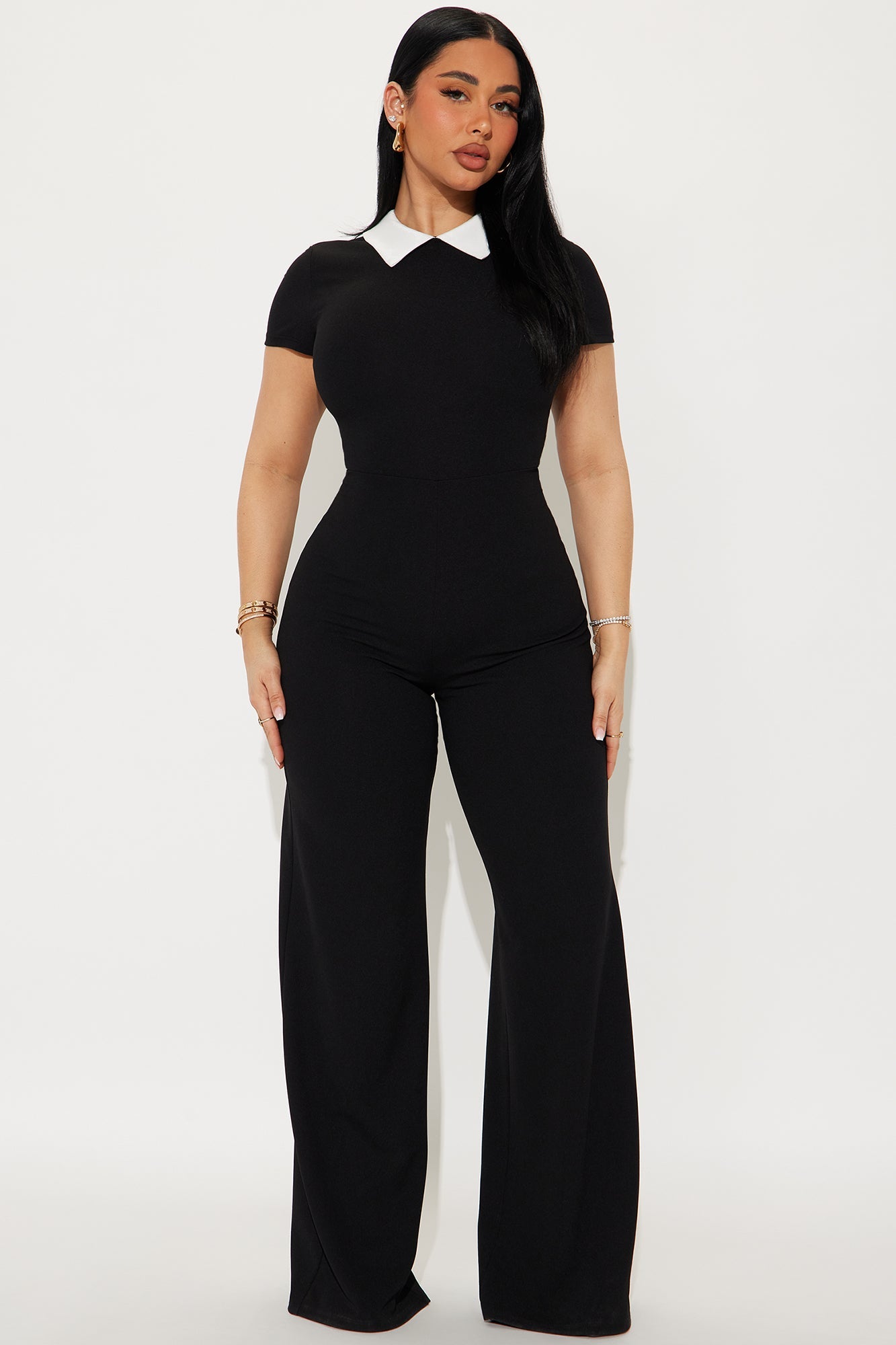 Fashion Nova black and white short sleeve jumpsuit featuring a stylish collar and fitted design