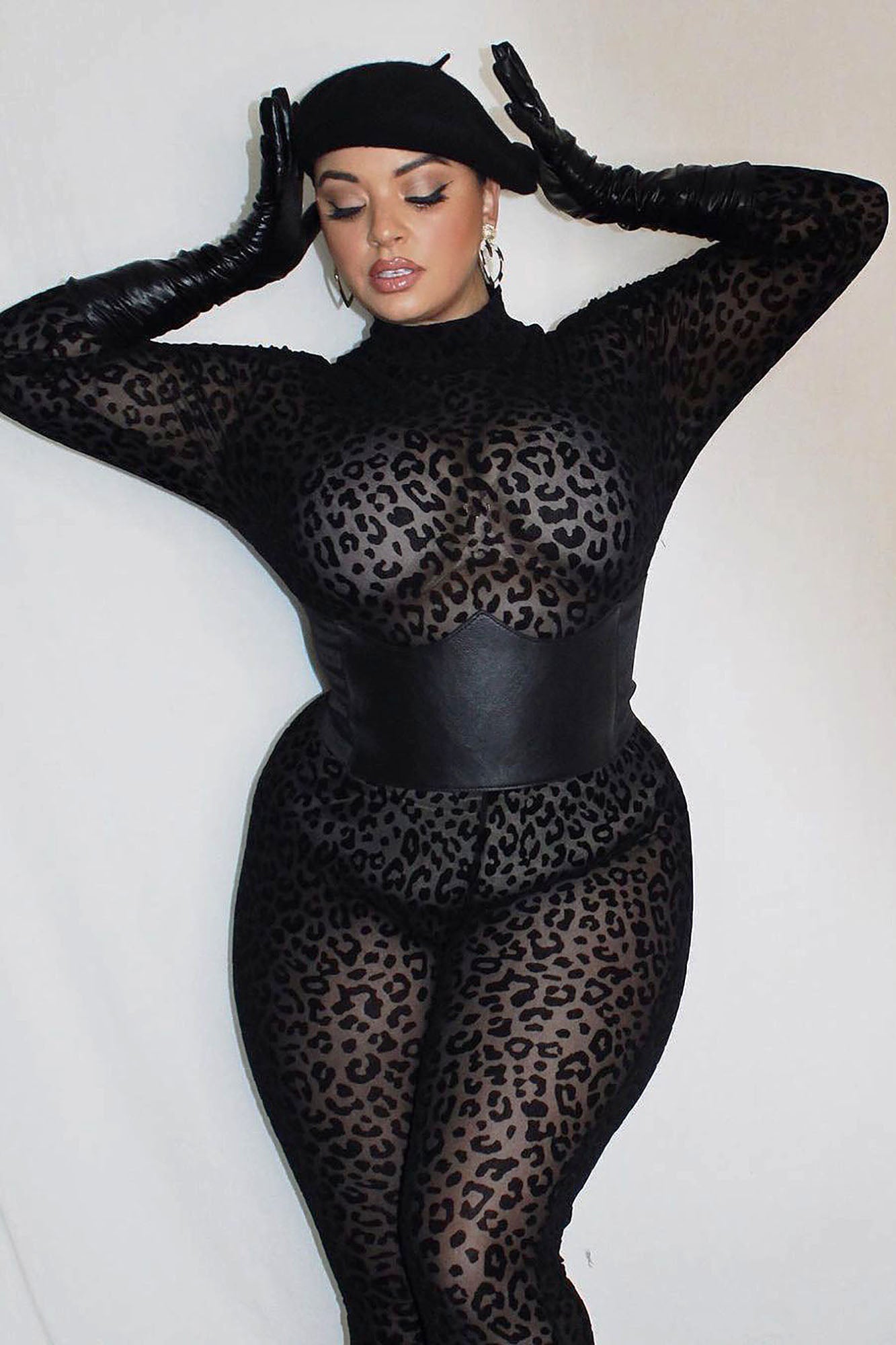 Fashion Nova black animal print mesh bodystocking featuring a stylish design and form-fitting silhouette