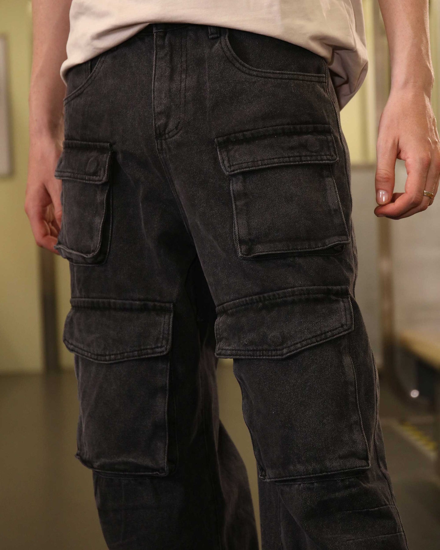 Logeqi black baggy jeans with pockets featuring multiple large cargo pockets and a relaxed fit