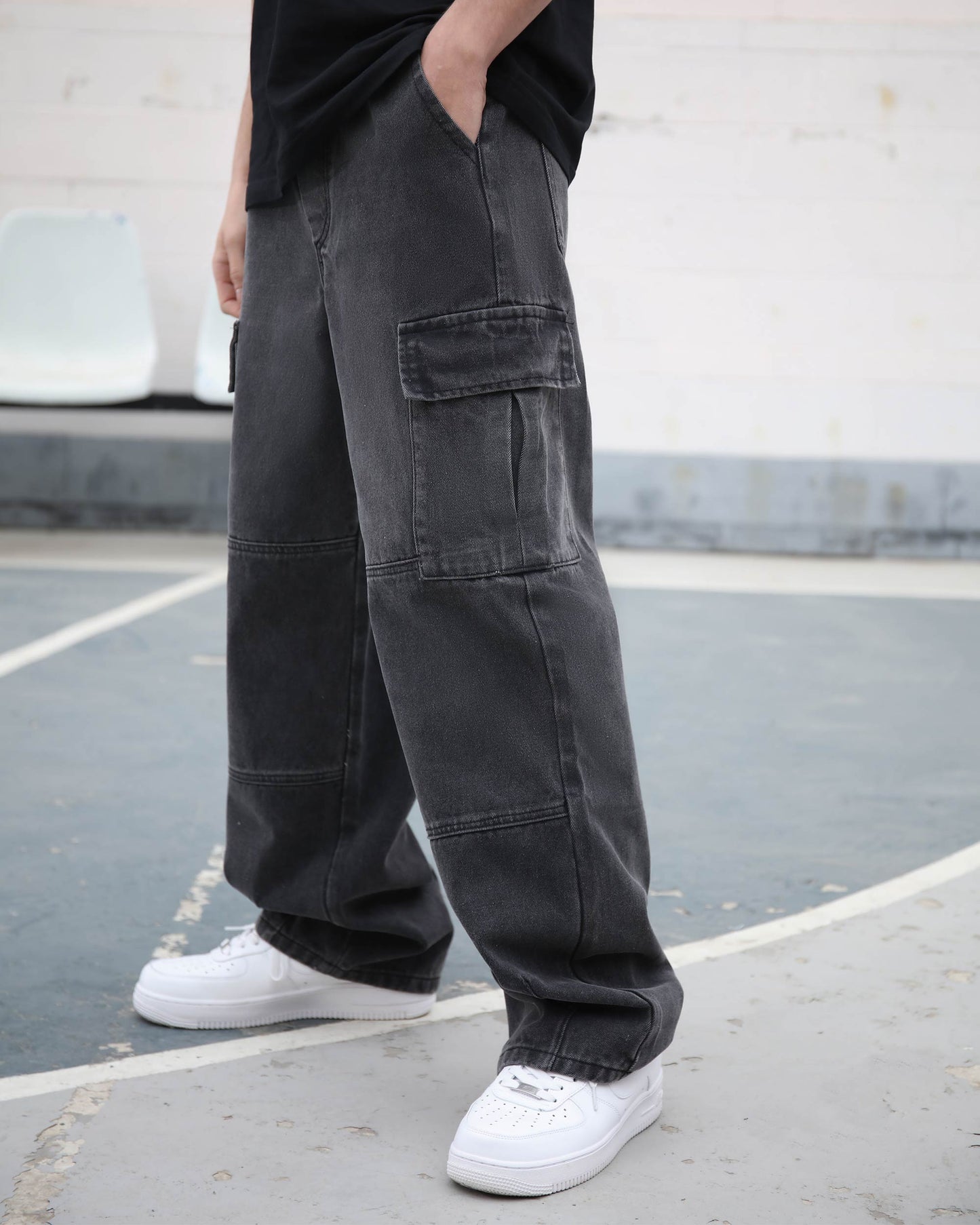 Logeqi black cargo jeans men styled with white sneakers and a casual black shirt