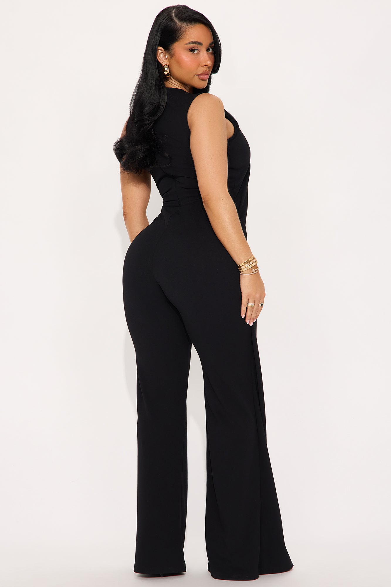 Stylish black jumpsuit for women featuring a fitted silhouette and flared legs