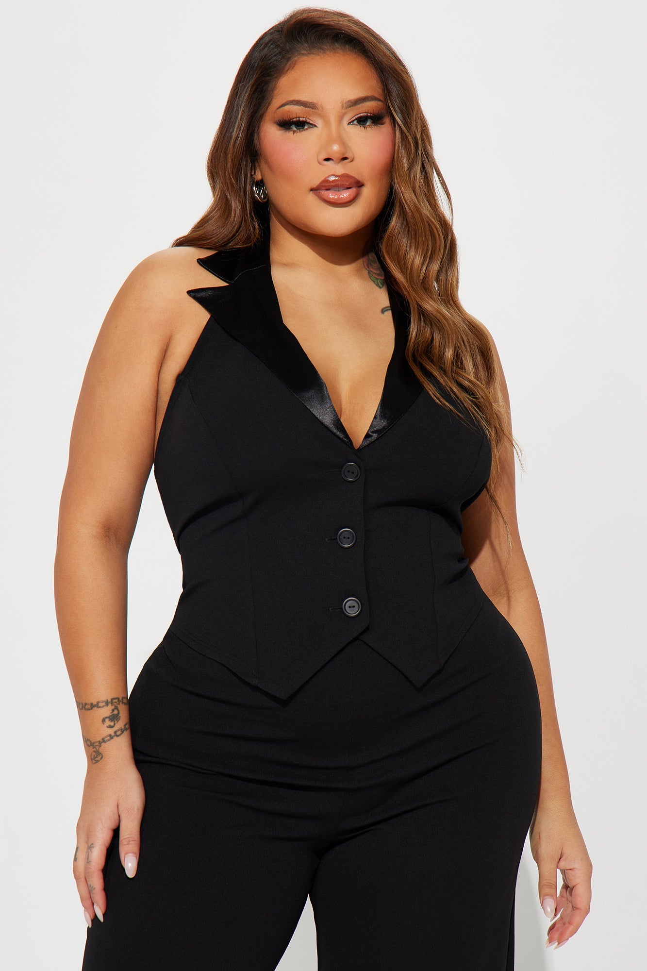 Fashion Nova black jumpsuit for women with a deep V neckline and tailored vest design