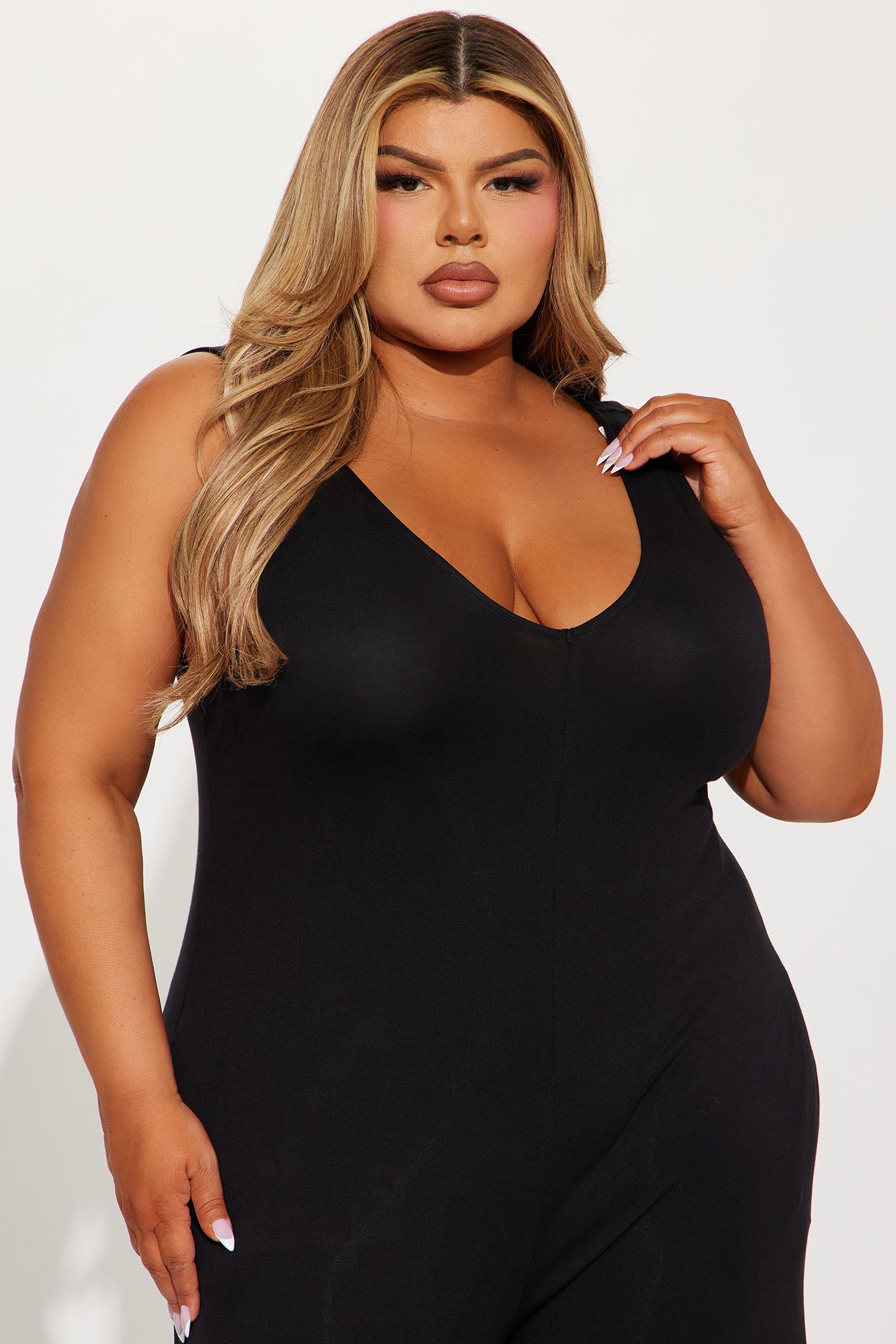 Stylish black jumpsuit for women featuring a flattering V-neck and comfortable fit