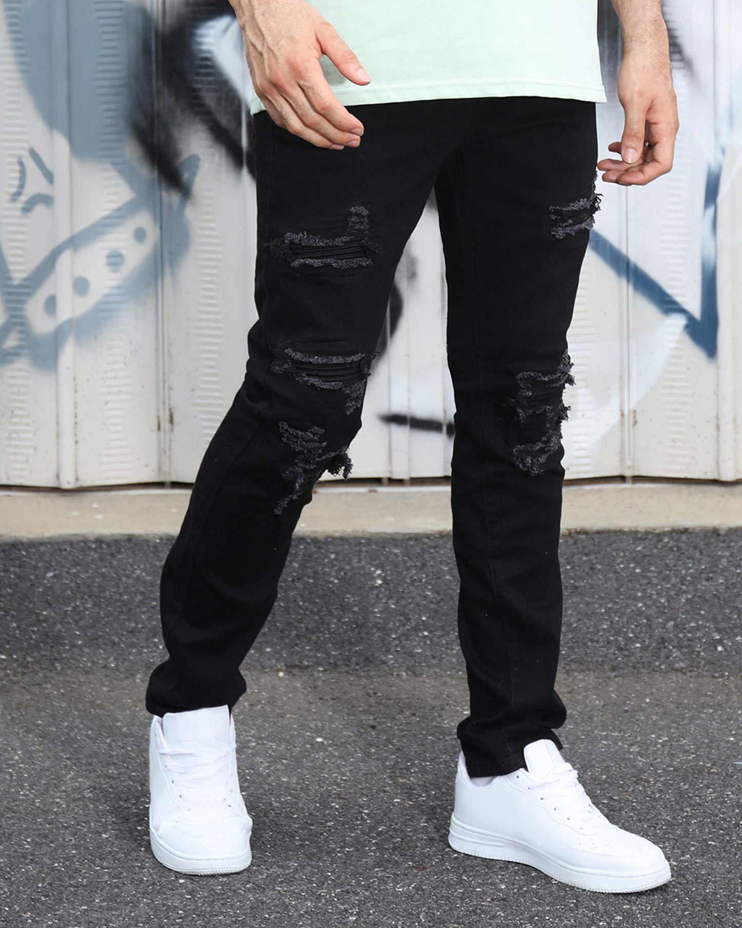 Men's Logeqi black ripped jeans for men with distressed detailing and a slim fit style