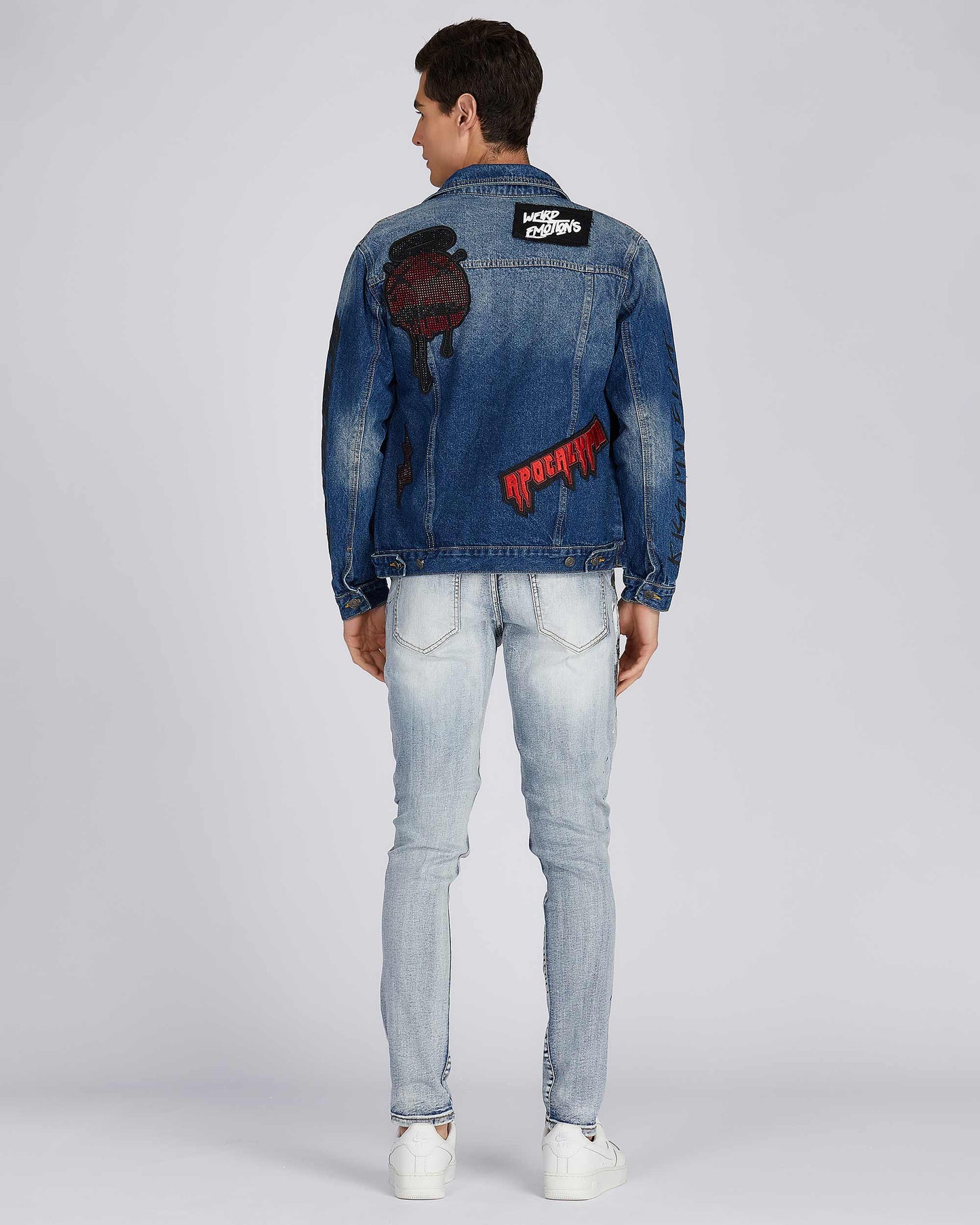 Logeqi blue denim jacket featuring unique patches and distressed detailing for a trendy look