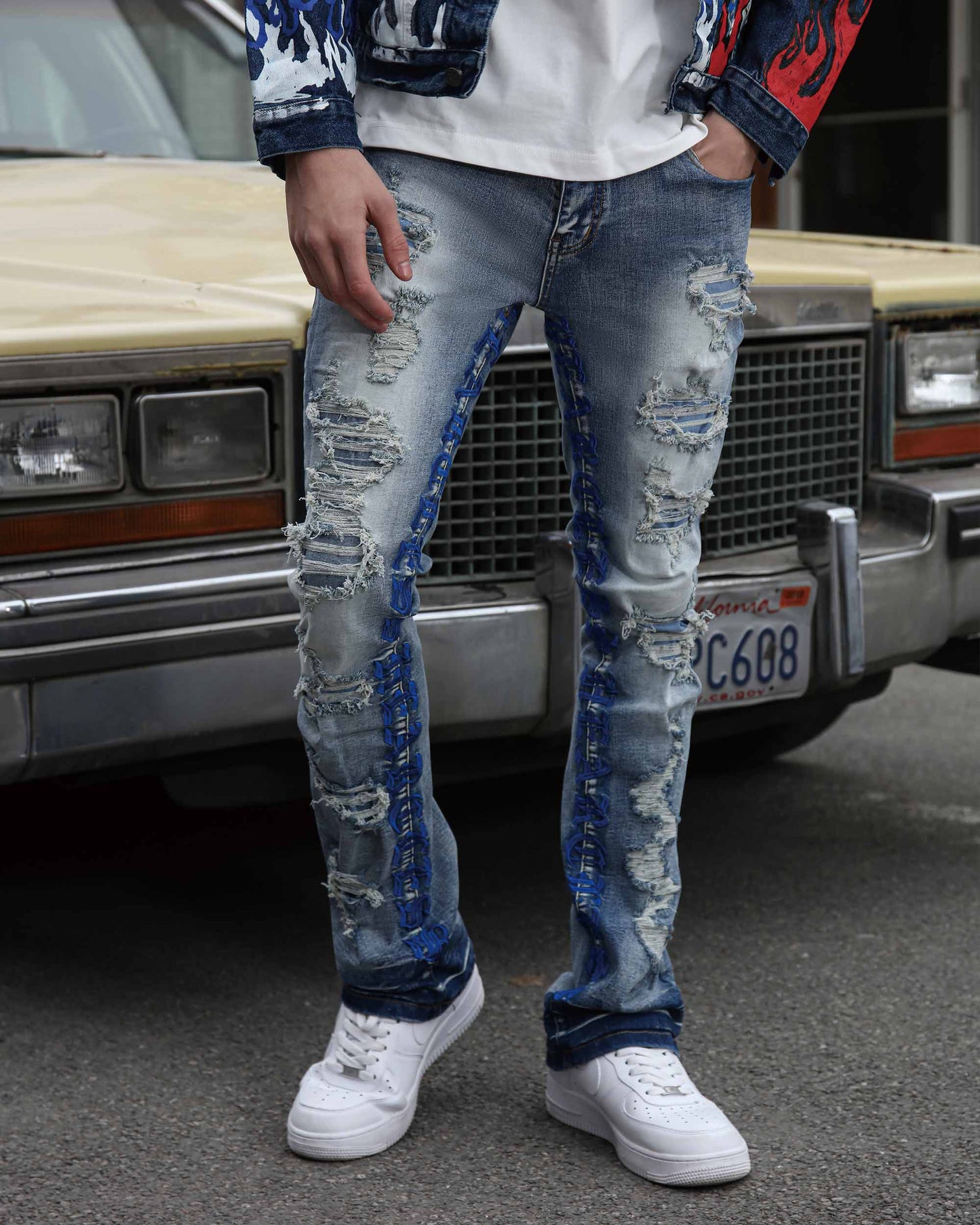 Logeqi blue retro flared jeans featuring distressed detailing and a stylish fit