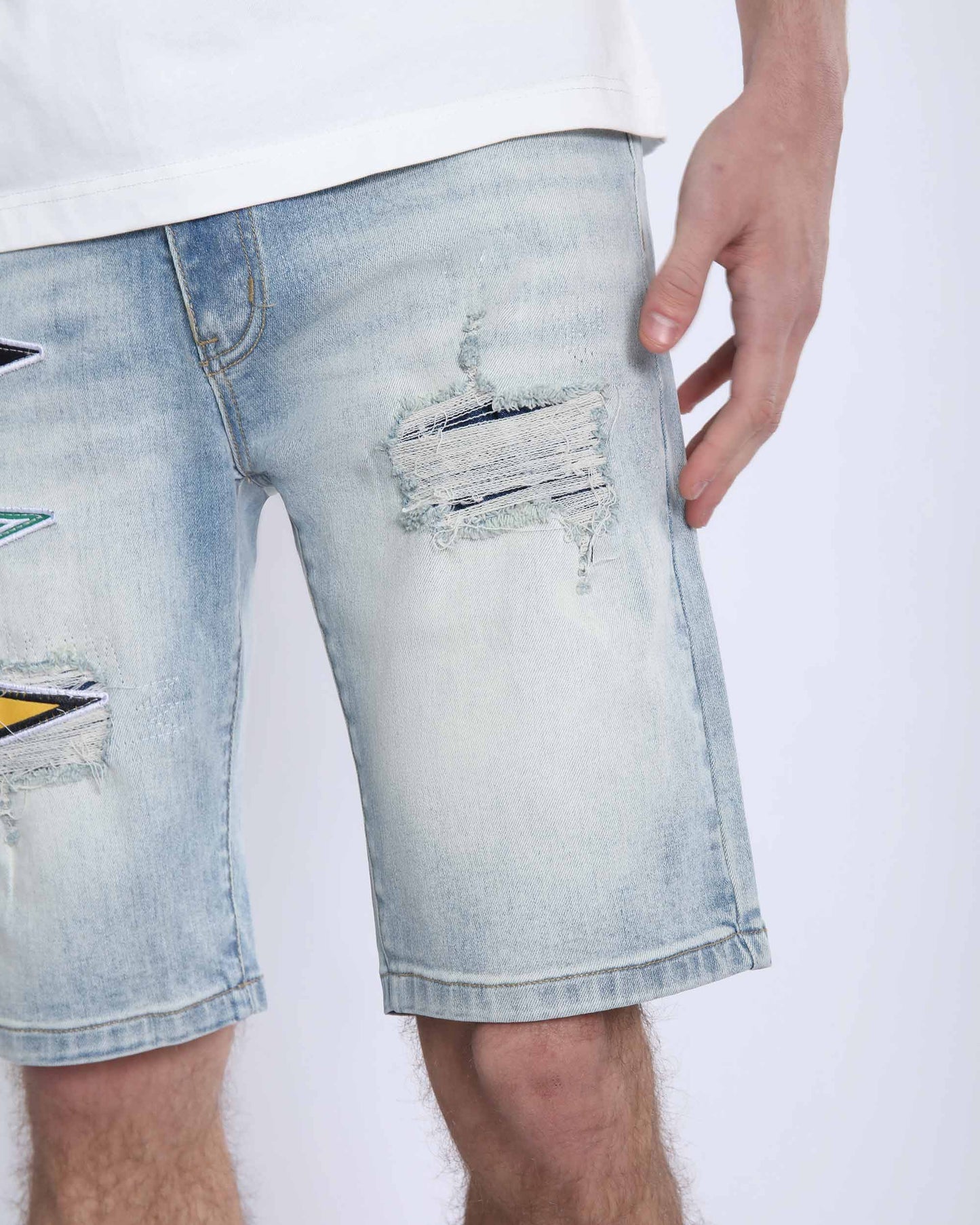 Logeqi light wash denim shorts with distressed details and colorful patch accents on side