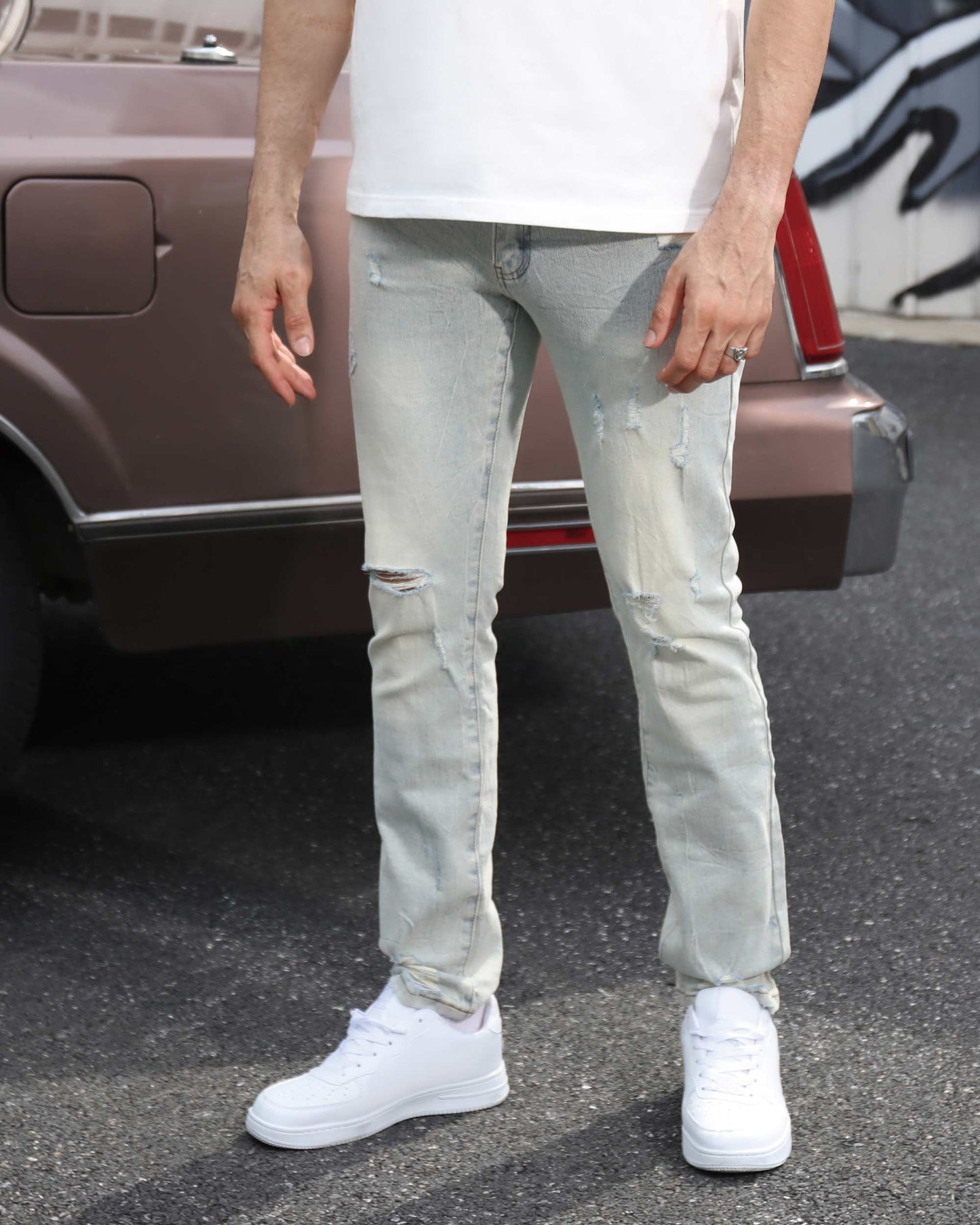 Logeqi straight fit ripped jeans in light wash, perfect for casual outings and stylish looks