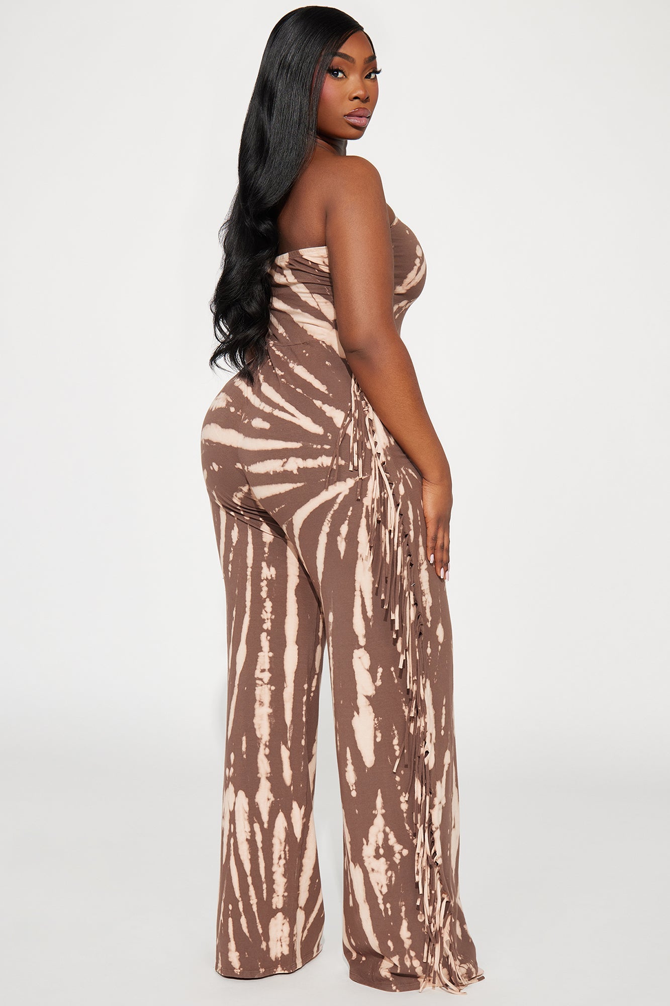 Fashion Nova brown tie dye jumpsuit with a trendy strapless design and flared legs