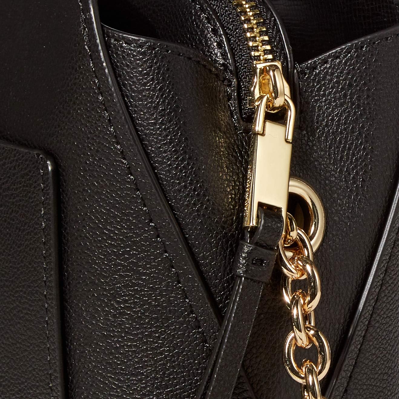Calvin Klein crossbody bag for women in black leather with gold-tone hardware and zipper detail