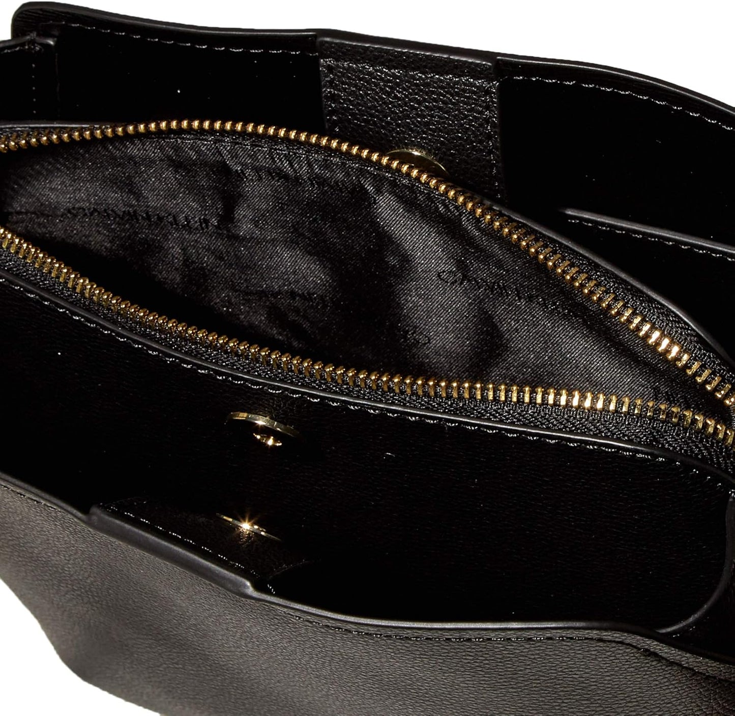 Interior view of a Calvin Klein crossbody bag for women showcasing spacious compartments and zip closure