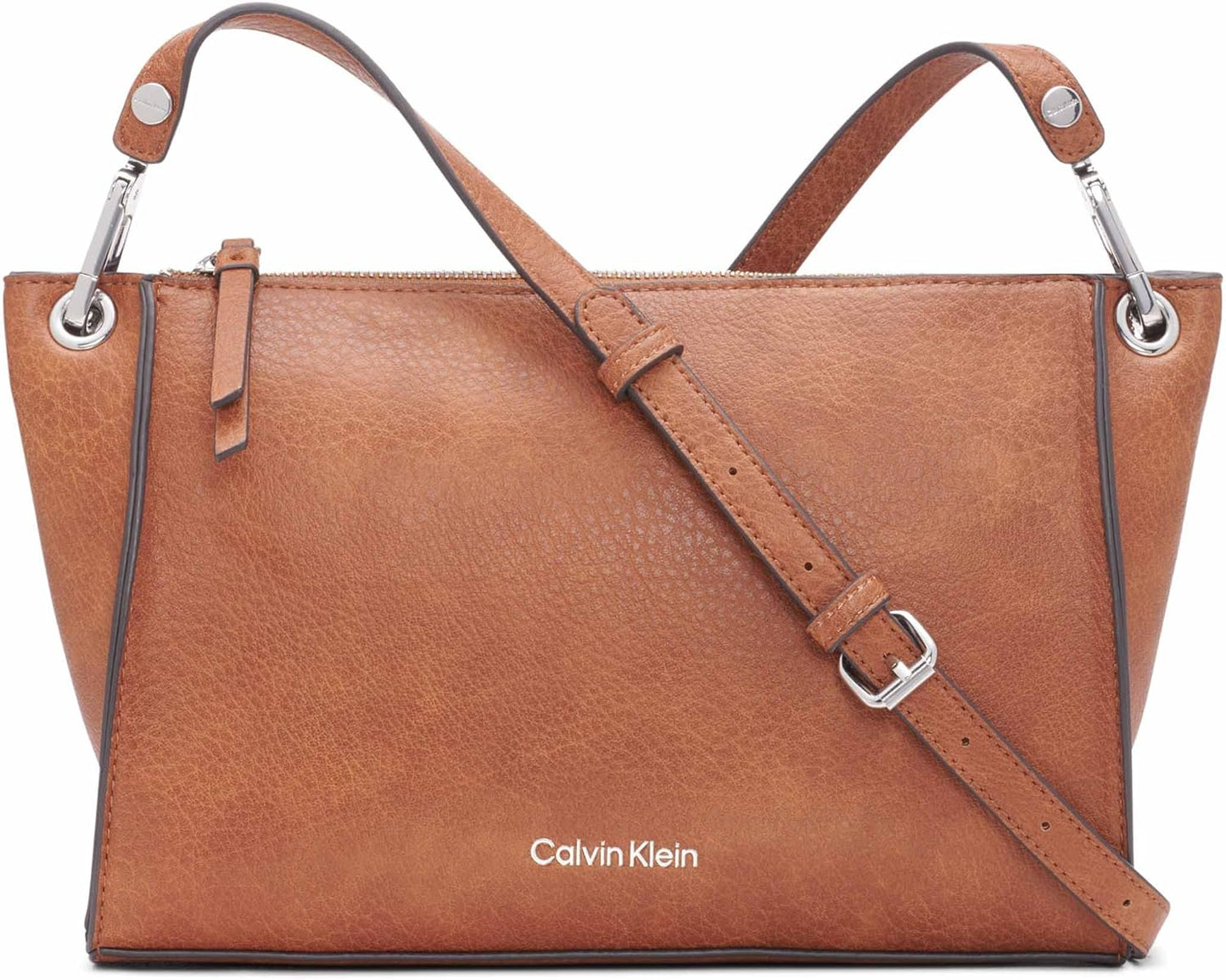 Calvin Klein Reyna crossbody bag in tan leather with adjustable strap and silver accents