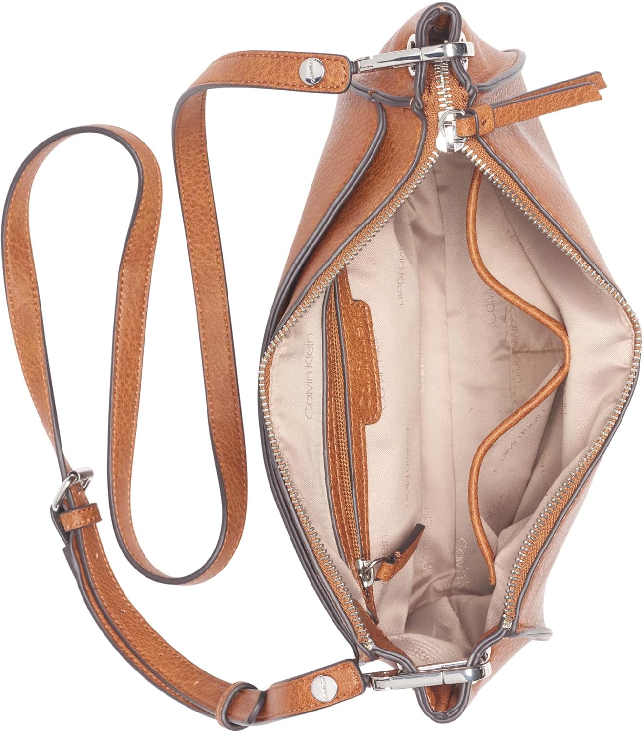 Calvin Klein Reyna crossbody bag in cognac with spacious interior and adjustable strap