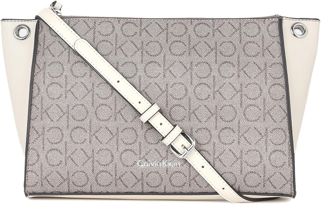 Calvin Klein Reyna crossbody bag with stylish logo design and adjustable strap for versatile use