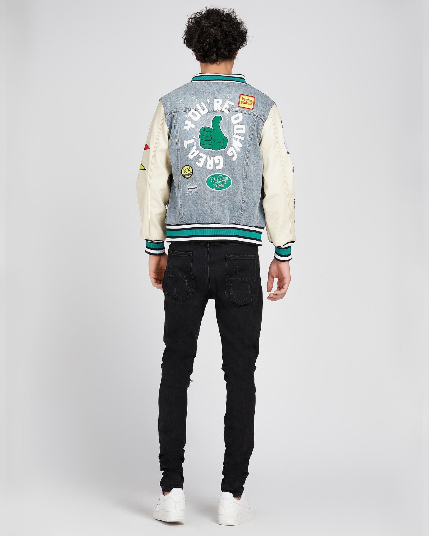 Logeqi cartoon denim baseball jacket with colorful patches and thumbs-up design on the back