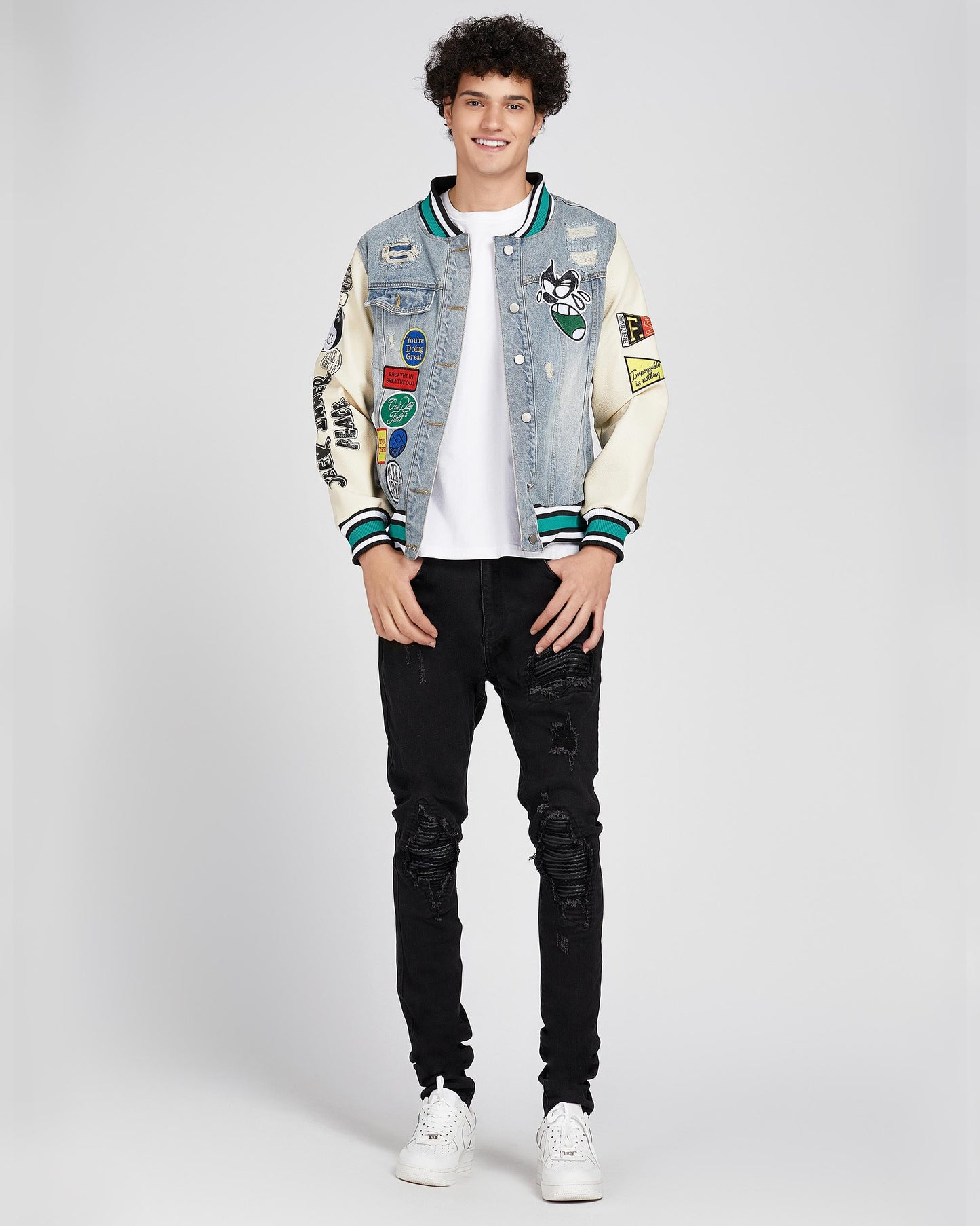 Logeqi cartoon denim baseball jacket featuring colorful patches and a classic sporty design