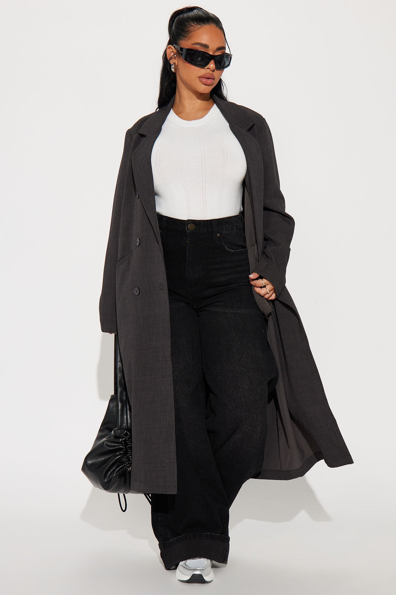 Stylish charcoal trench coat for women paired with a white top and black wide-leg jeans