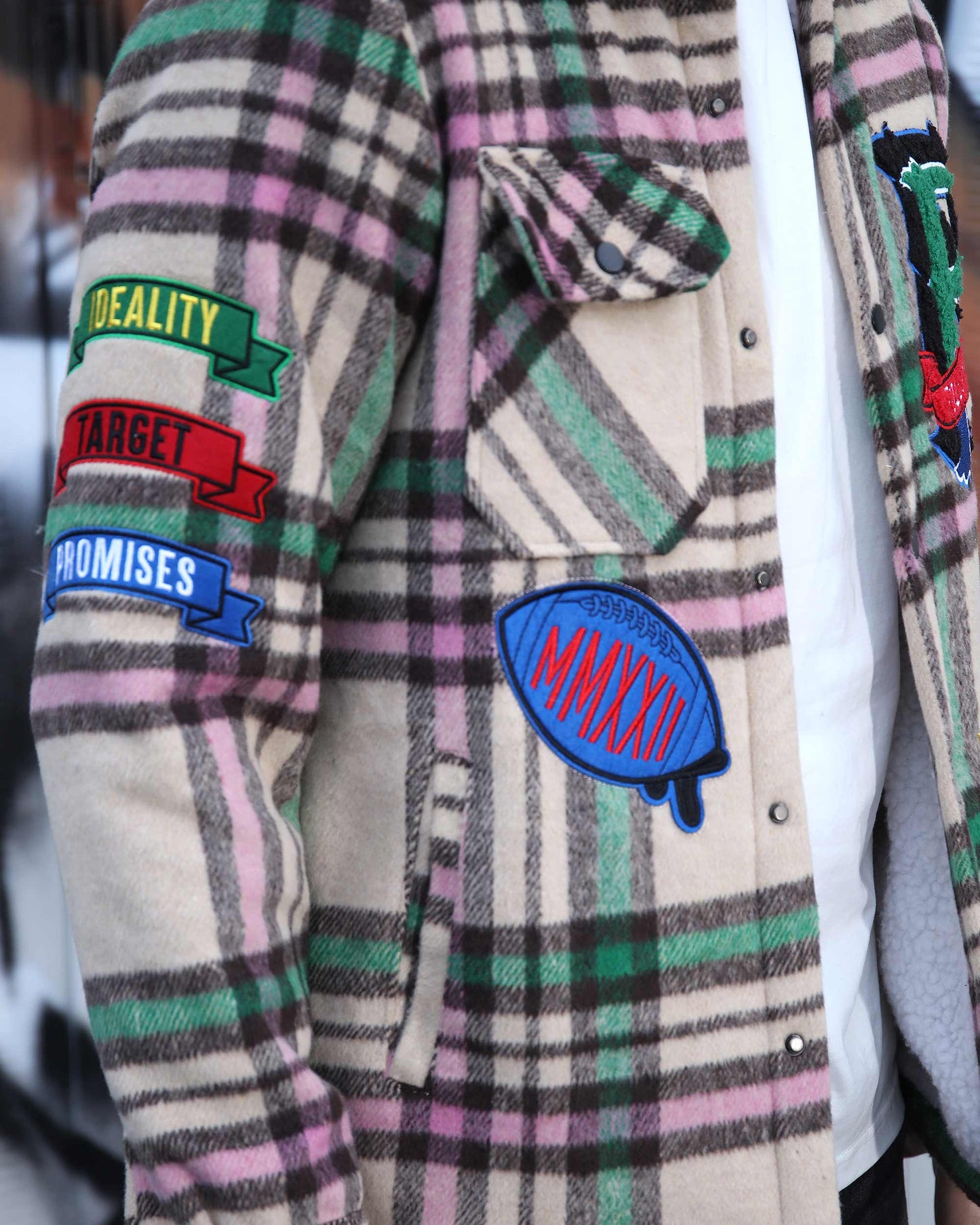 Logeqi checkered plaid moto jacket featuring vibrant patches and a stylish design for a trendy look
