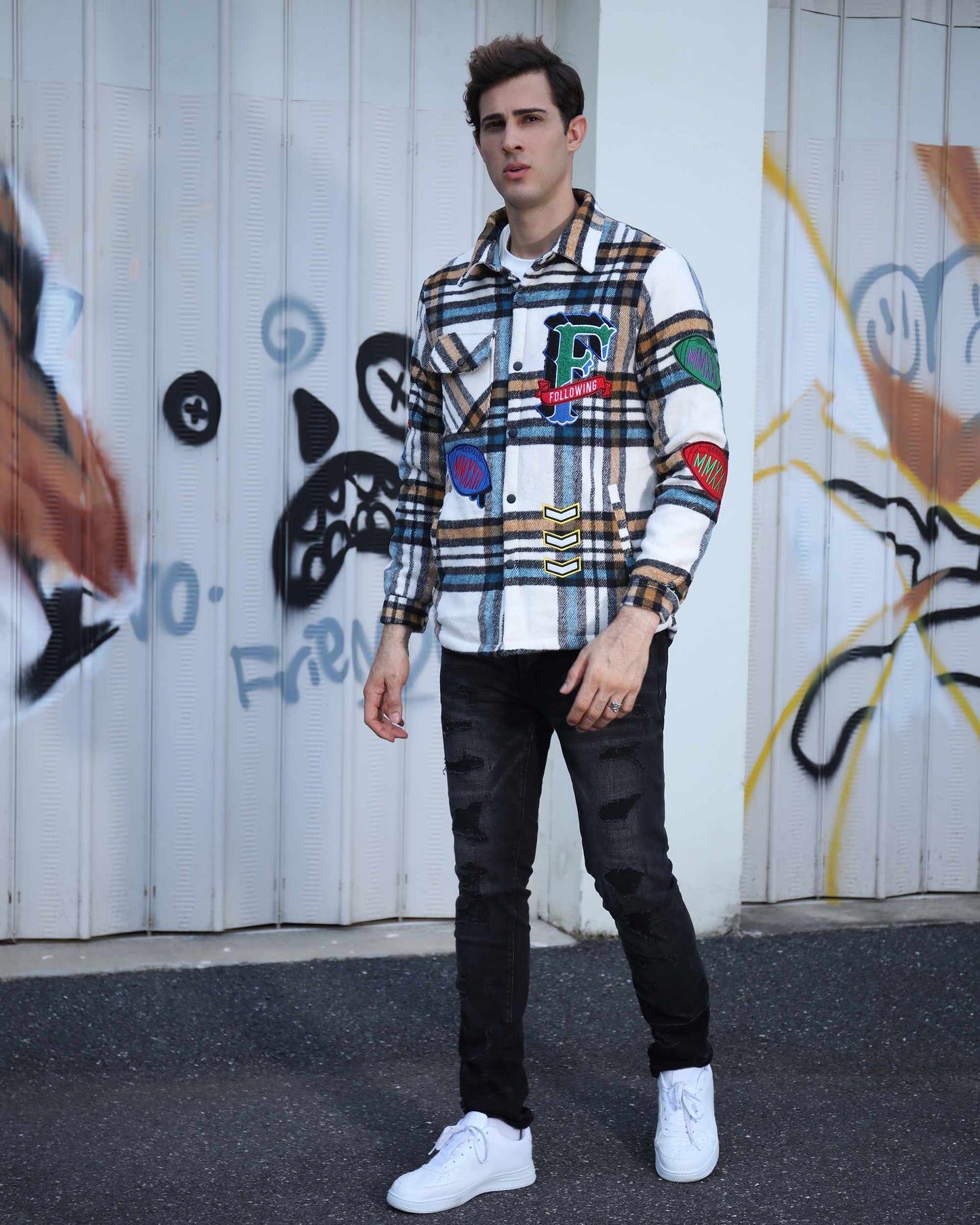 Checkered plaid moto jacket by Logeqi with colorful patches, perfect for a stylish urban look