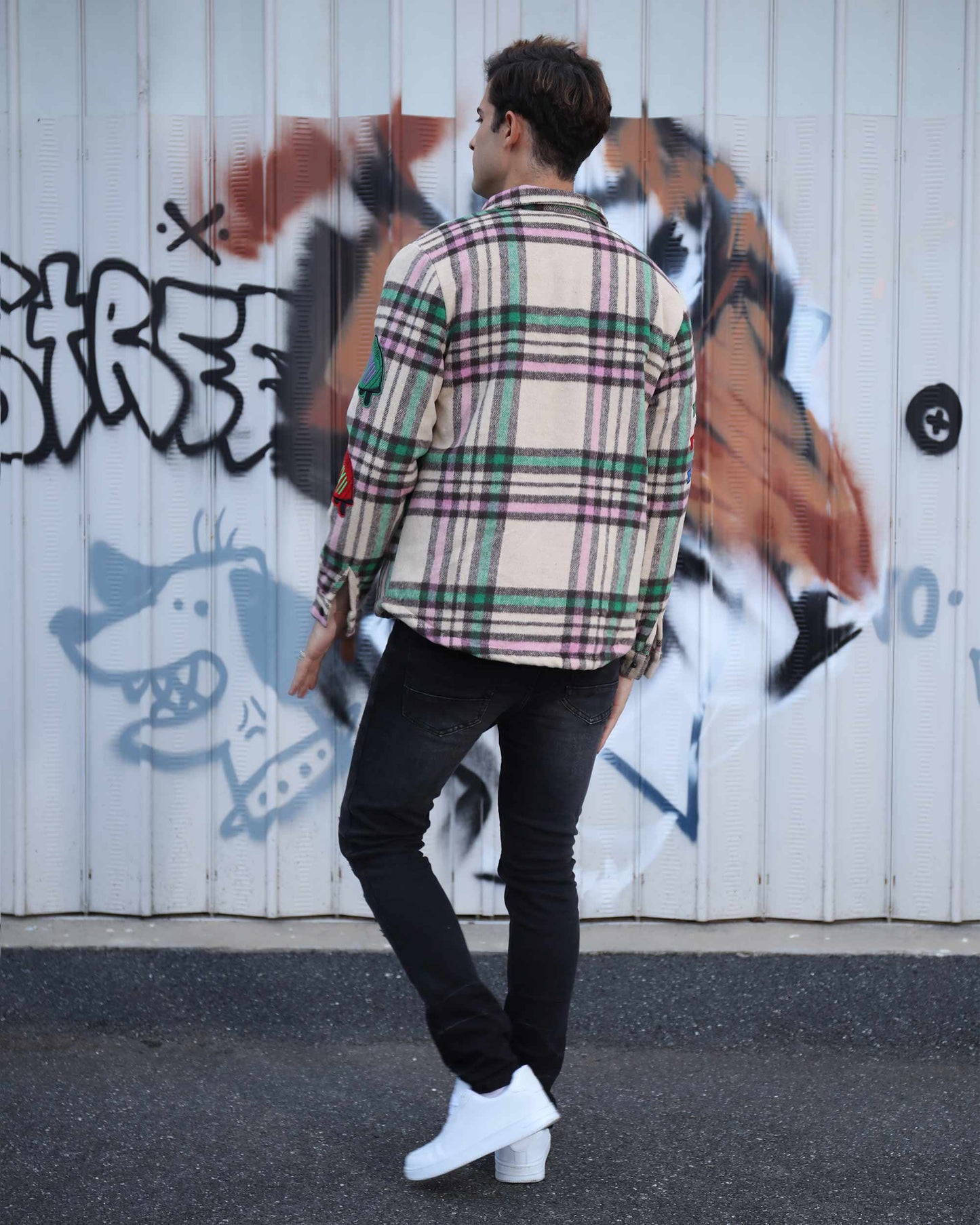 Logeqi checkered plaid moto jacket featuring a stylish design and back view against a graffiti backdrop