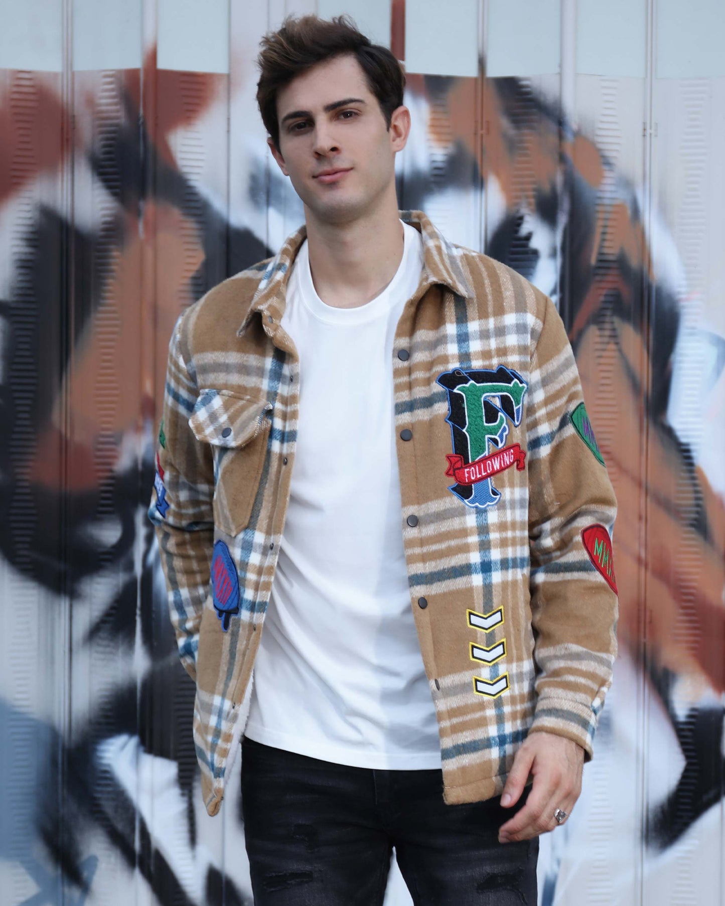 Logeqi checkered plaid moto jacket with colorful patches on a stylish model
