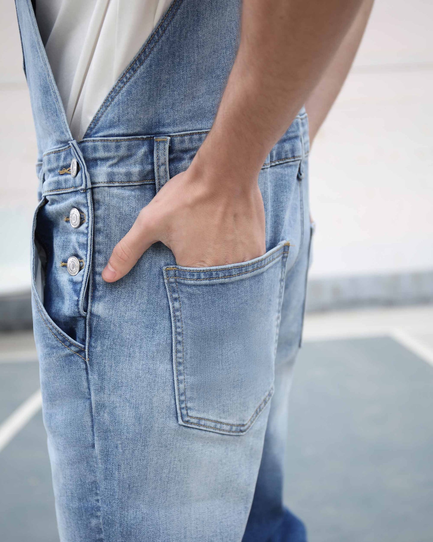 Logeqi classic denim overalls in light blue with front pocket and button details