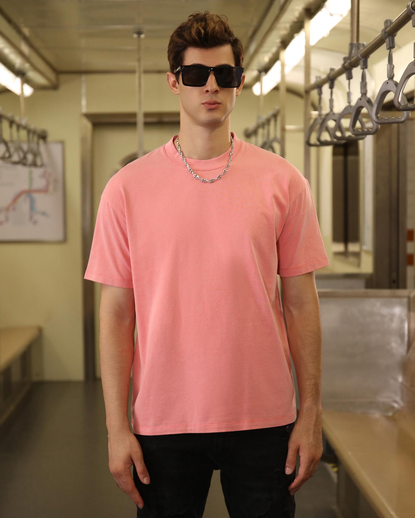 Logeqi classic pink t-shirt styled in a modern subway setting, perfect for casual wear