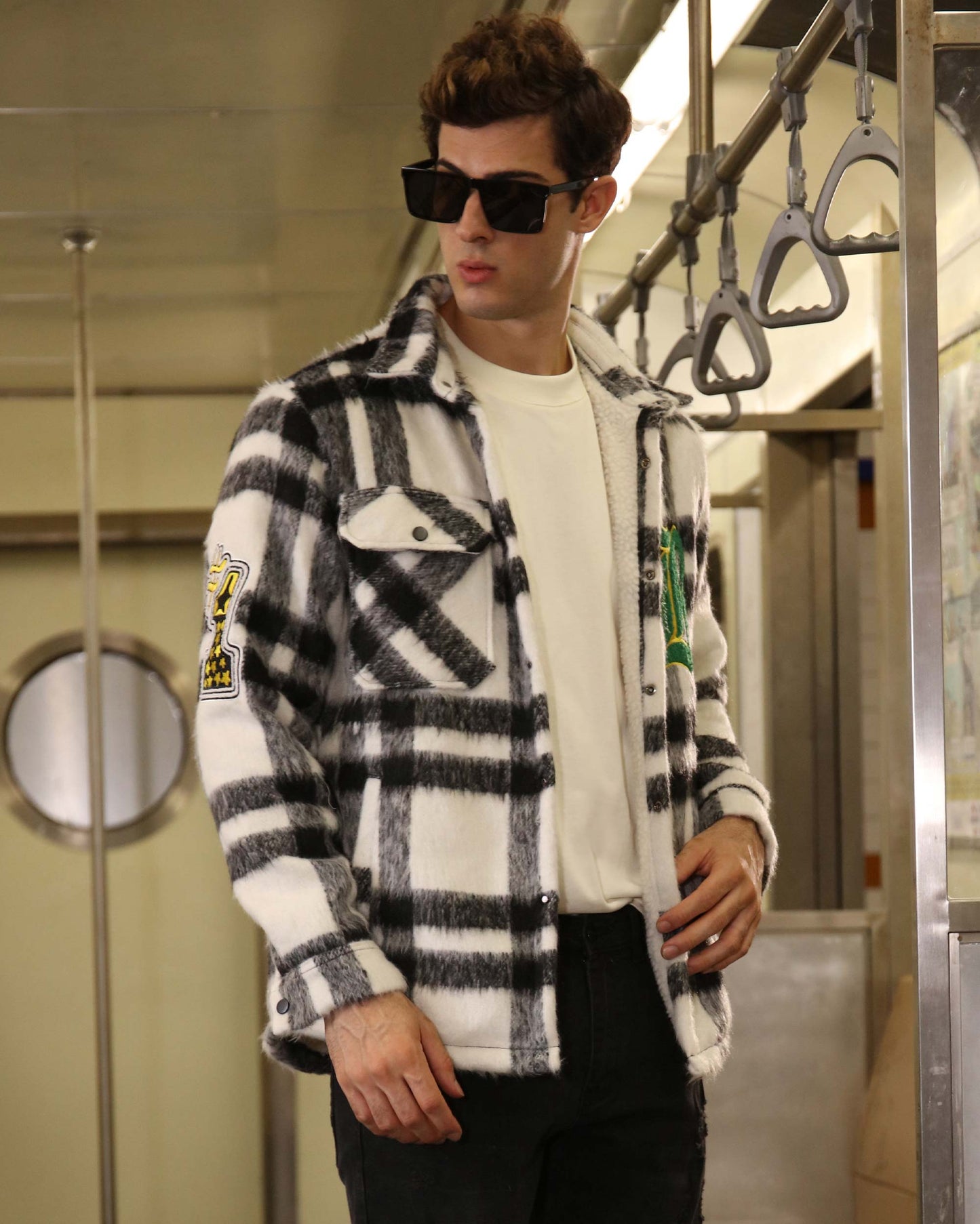 Logeqi classic plaid moto jacket in black and white worn by a man with sunglasses