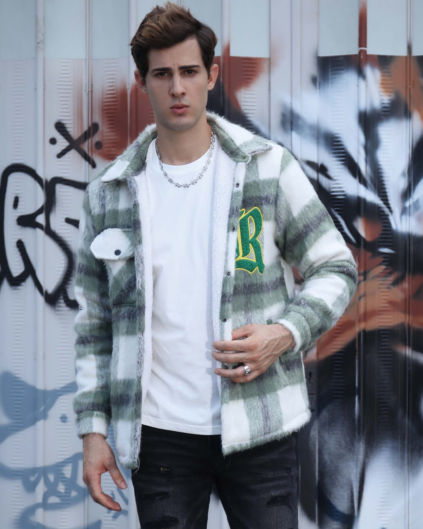 Logeqi classic plaid moto jacket in white and green worn by man with chain necklace