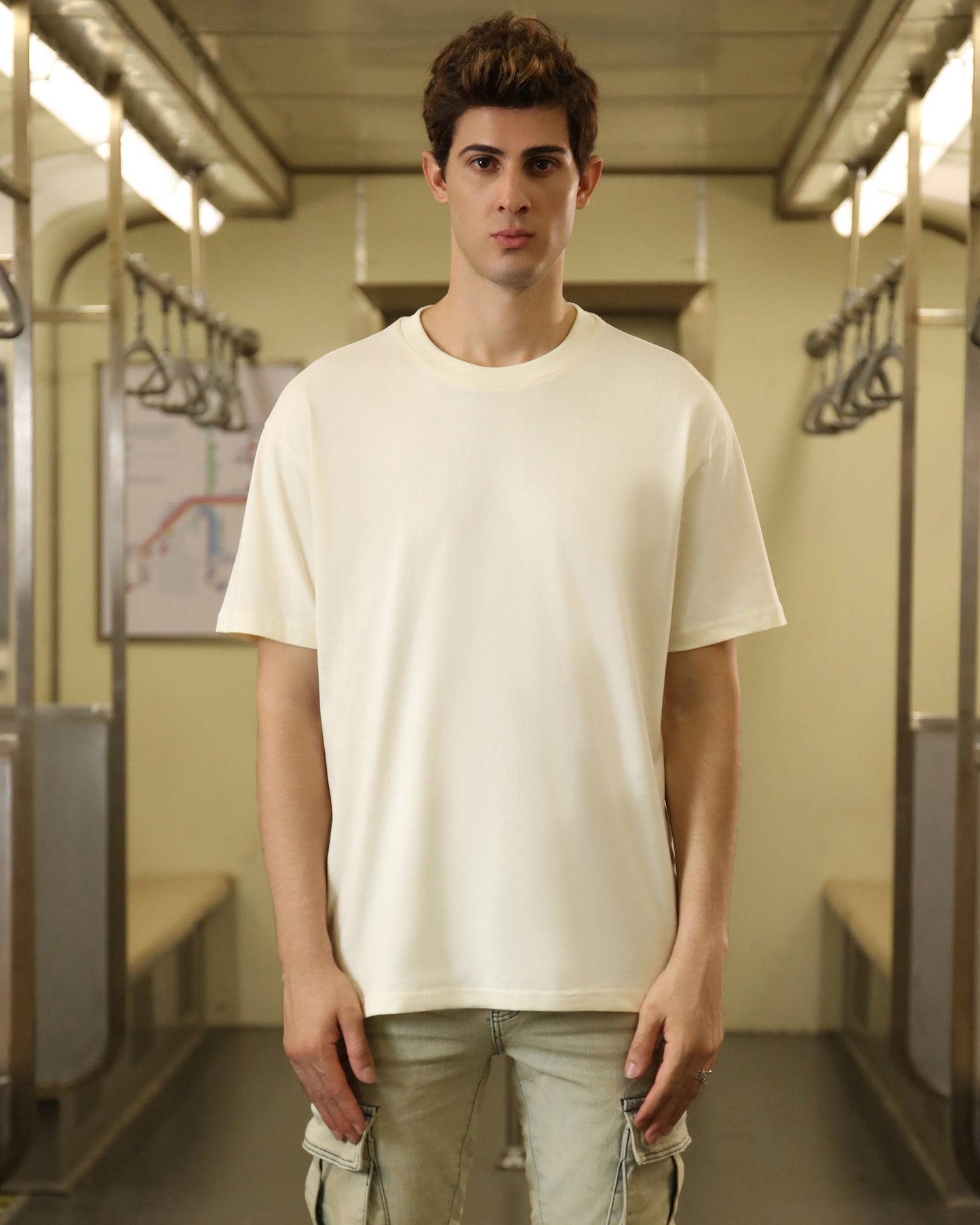 Logeqi cream oversized t-shirt offering a relaxed fit and stylish look for everyday wear
