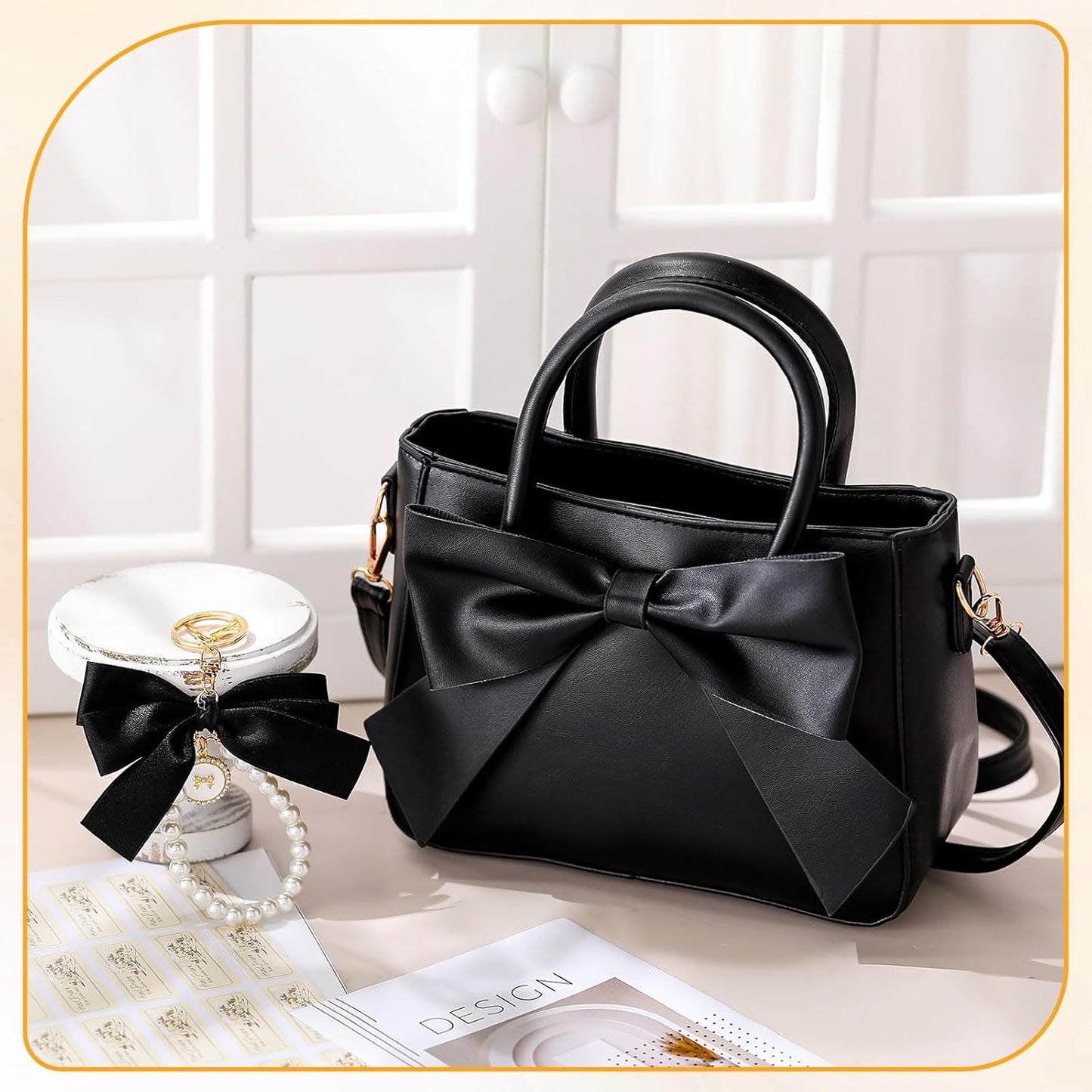 Black Modan Online crossbody bag with large bow detail, one of the cute purses for women