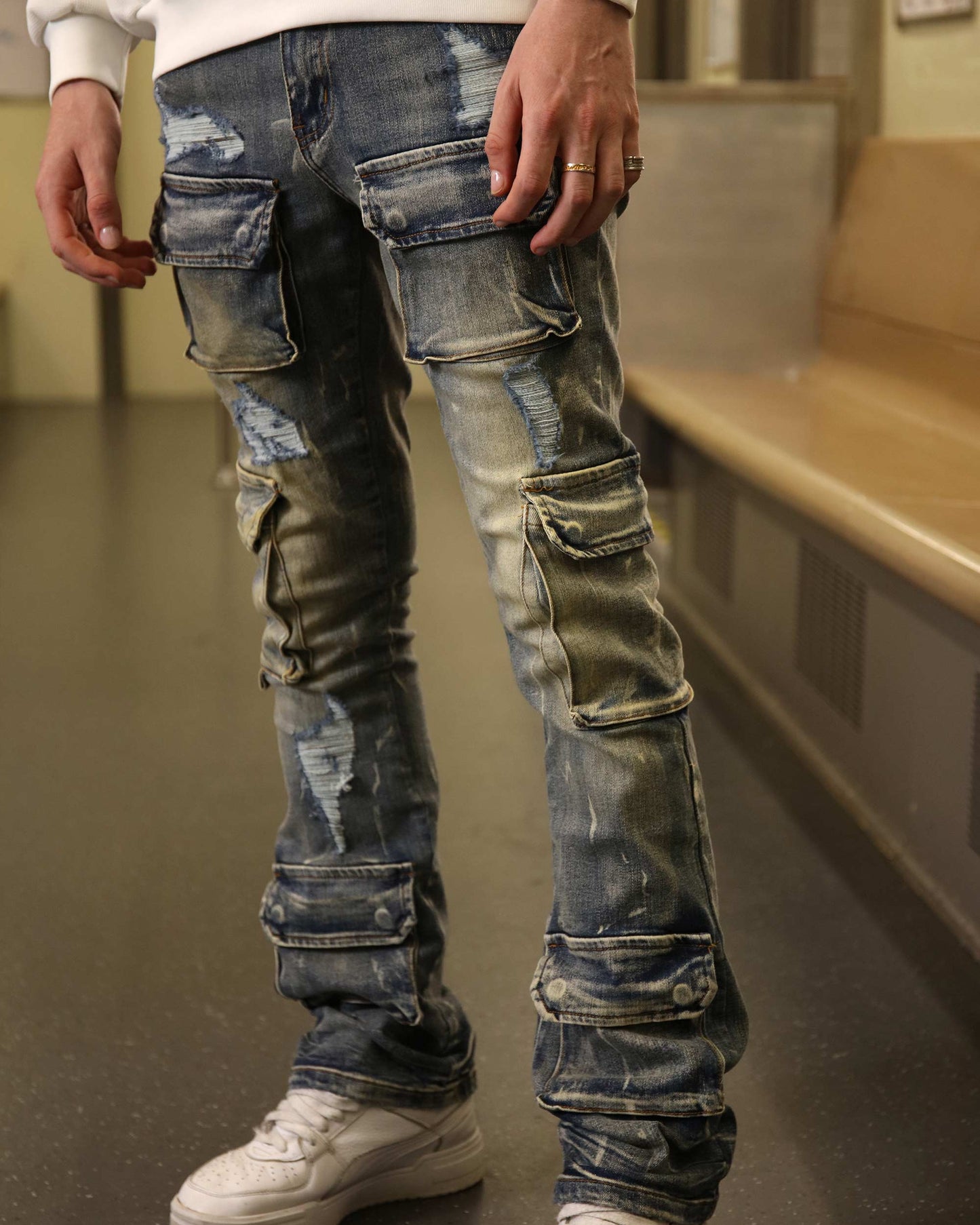 Logeqi dark wash cargo jeans featuring a distressed design and multiple pockets for a unique look