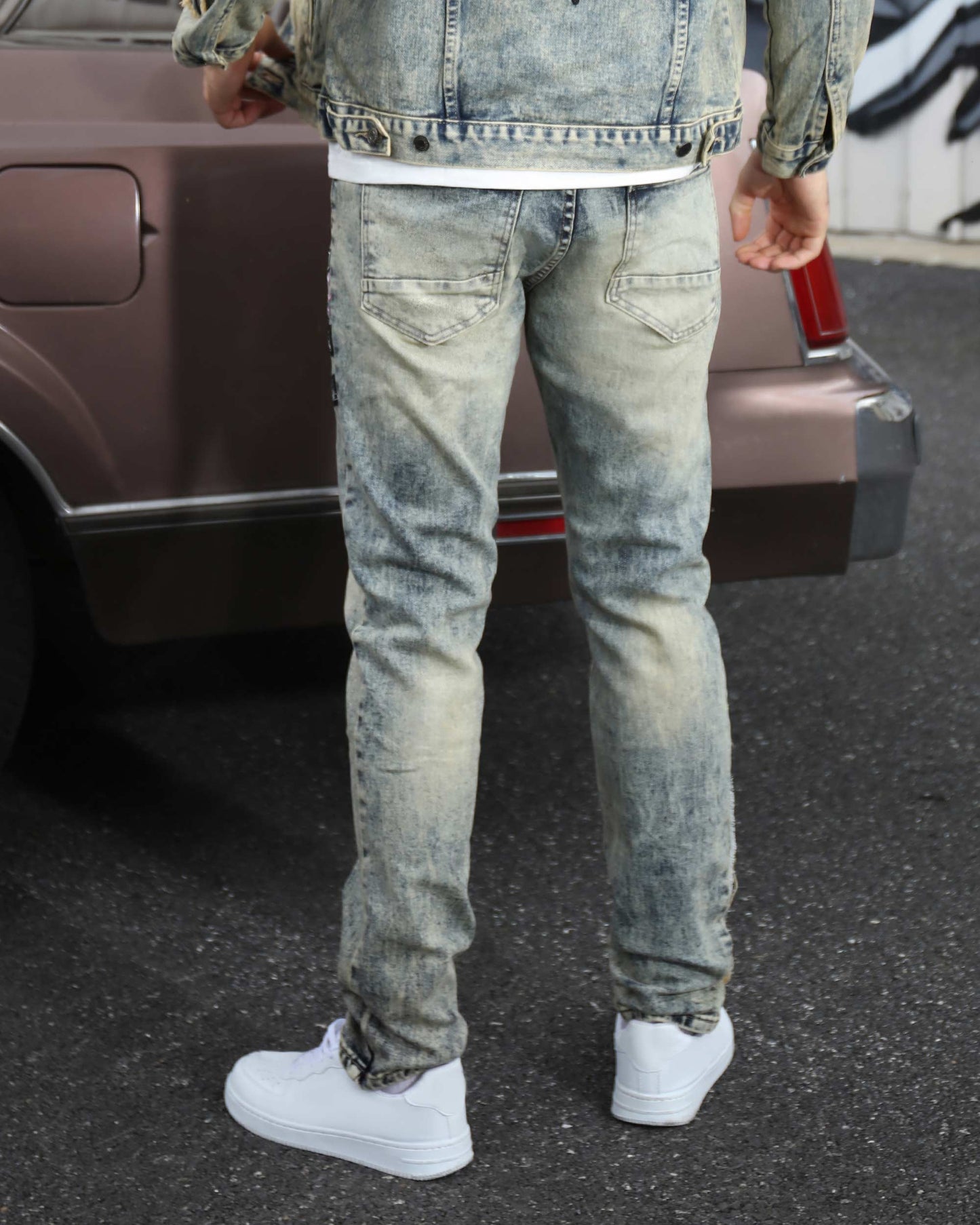 Logeqi dark washed straight leg jeans styled with a denim jacket and white sneakers