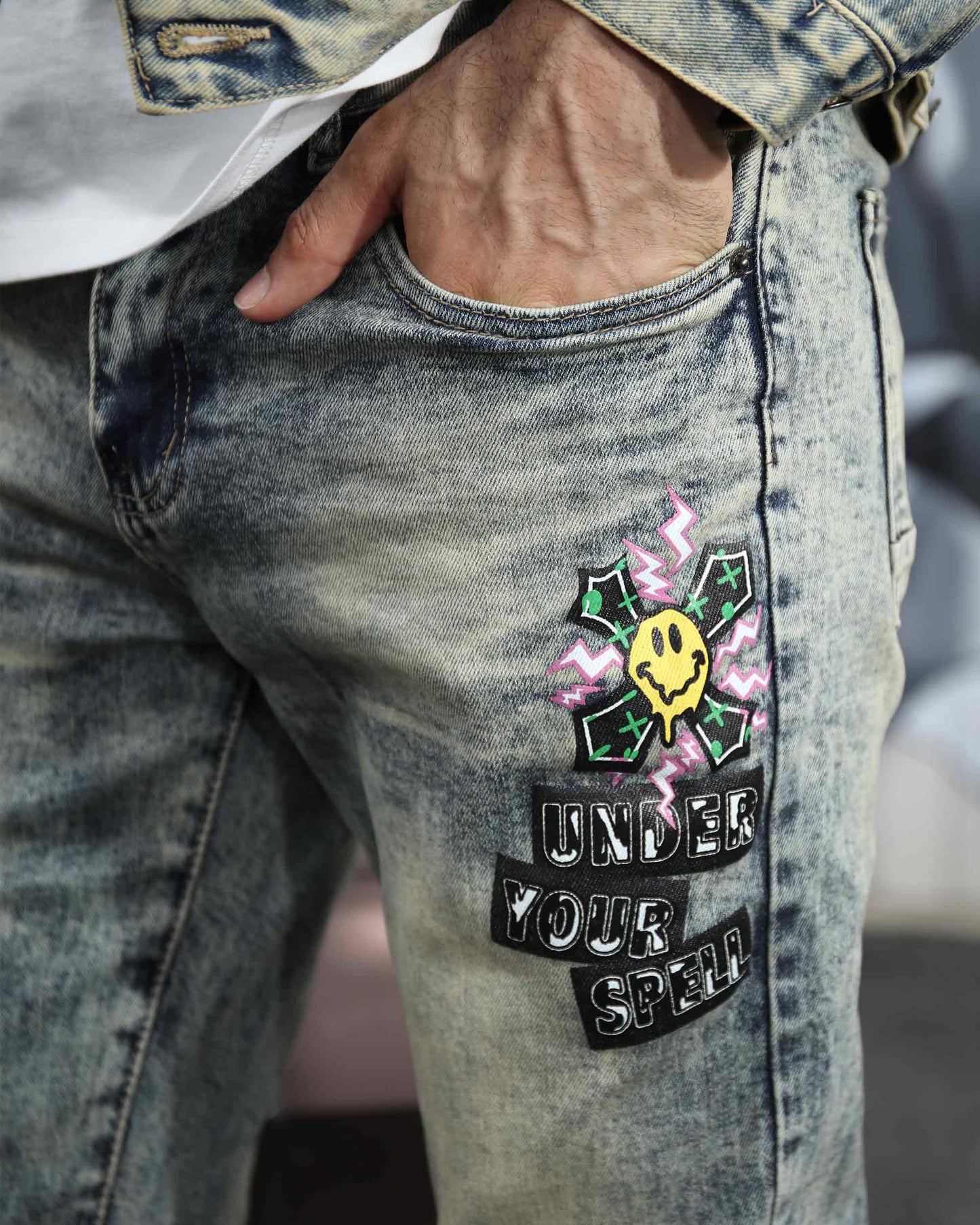Logeqi dark washed straight leg jeans with decorative patch and unique design details