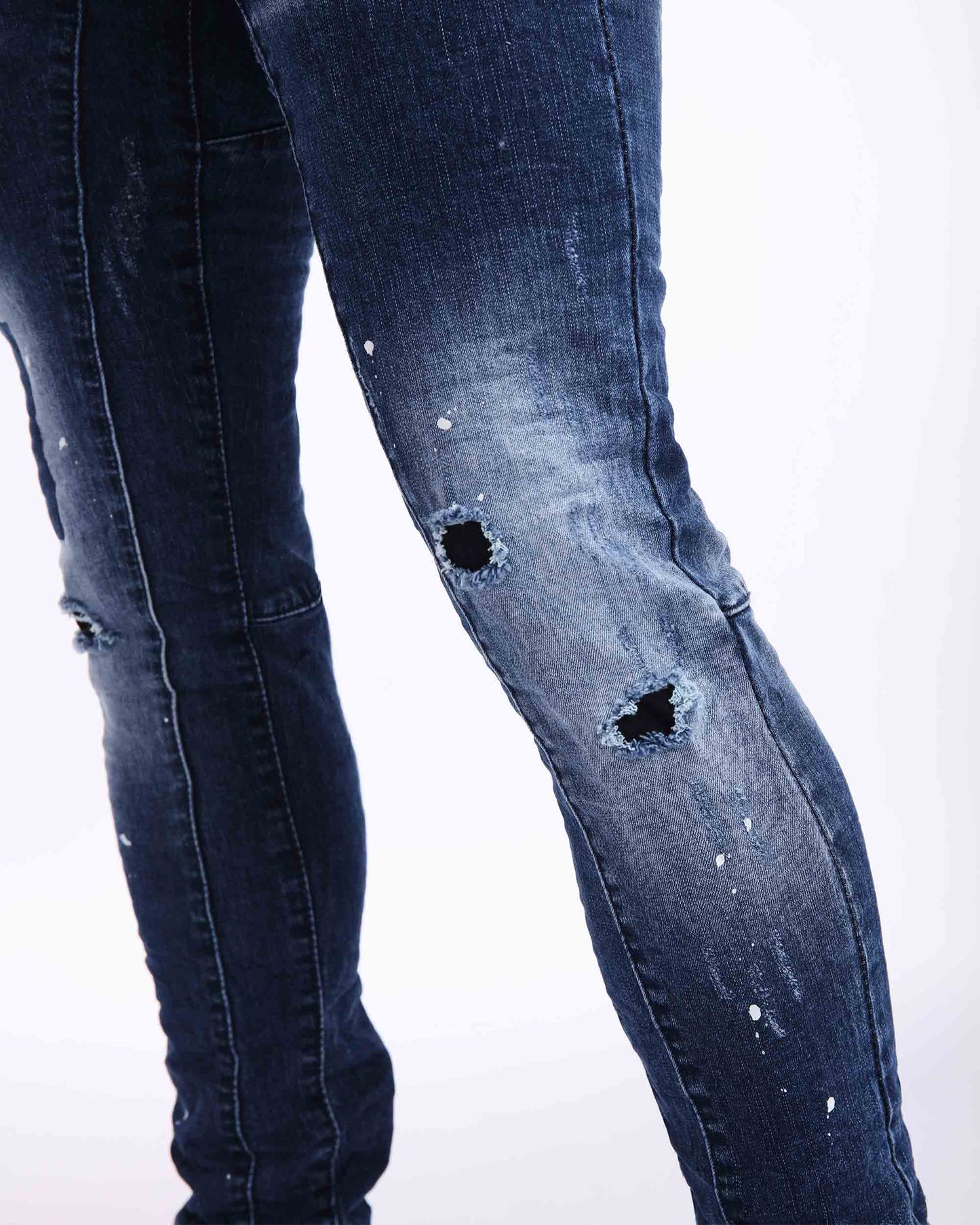 Logeqi denim spray paint jeans featuring distressed details and a fitted design for a trendy look