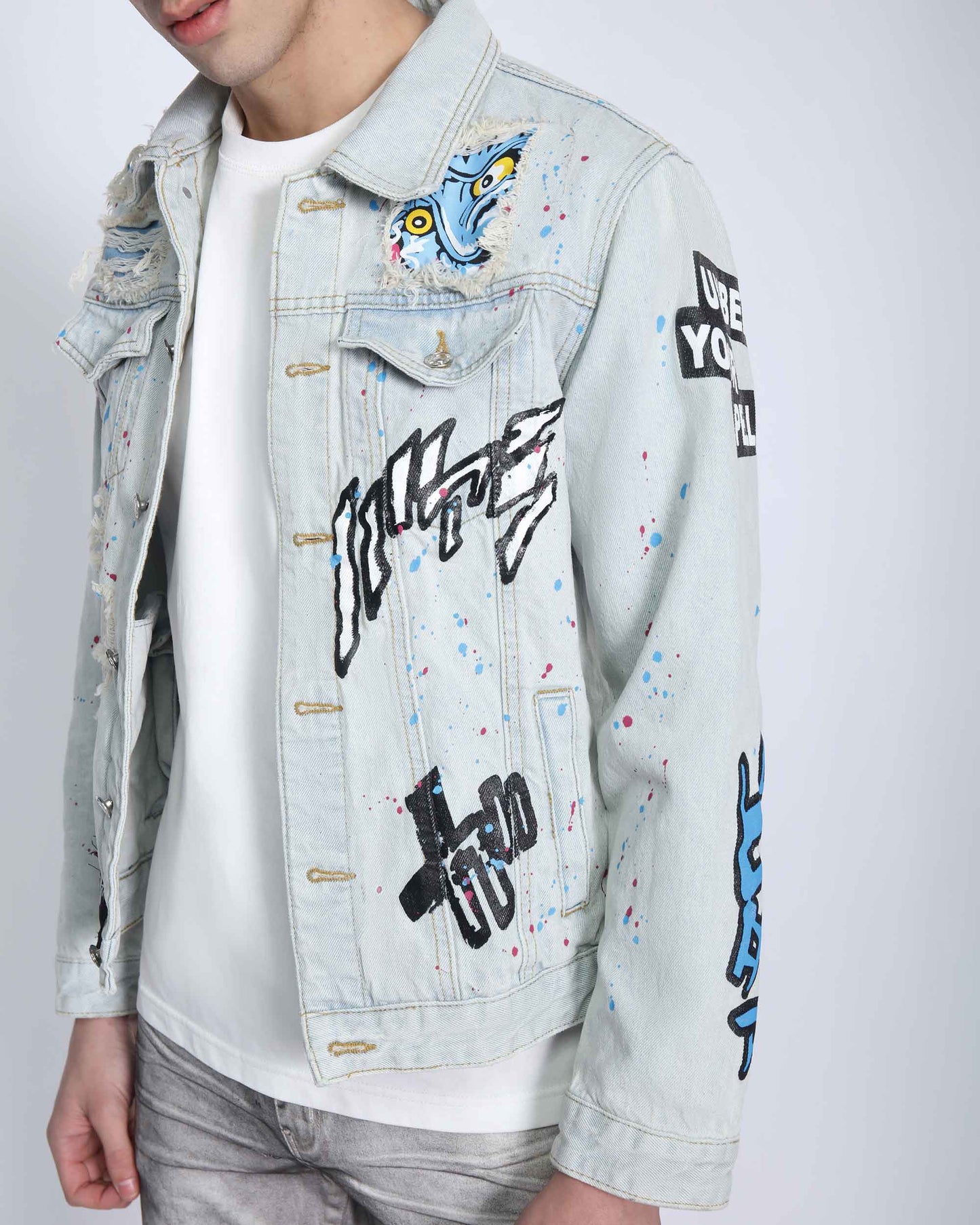 Logeqi distressed blue denim jacket with colorful graffiti and artistic designs for a trendy look