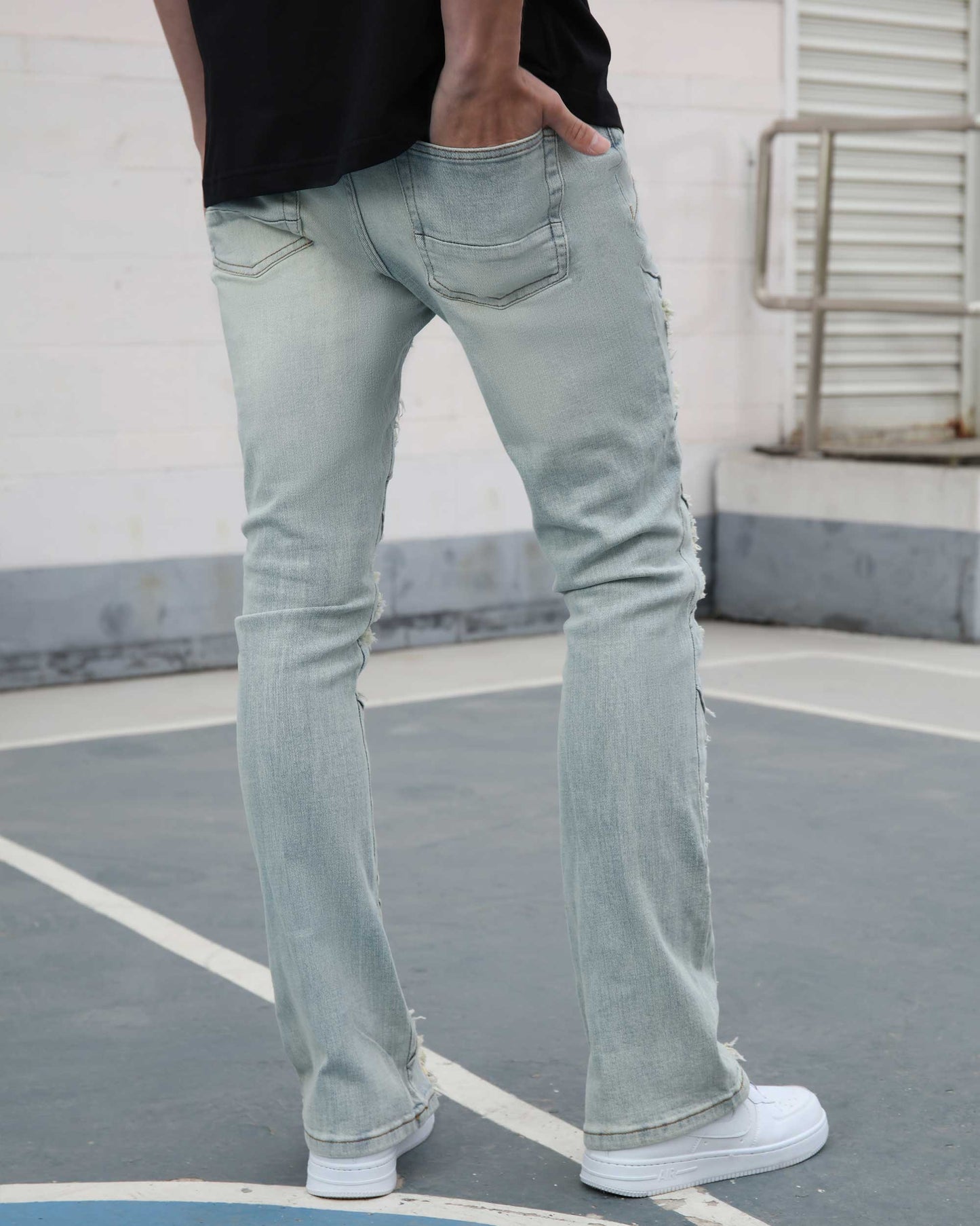 Logeqi distressed blue jeans with a faded design and stylish frayed hems for a modern look