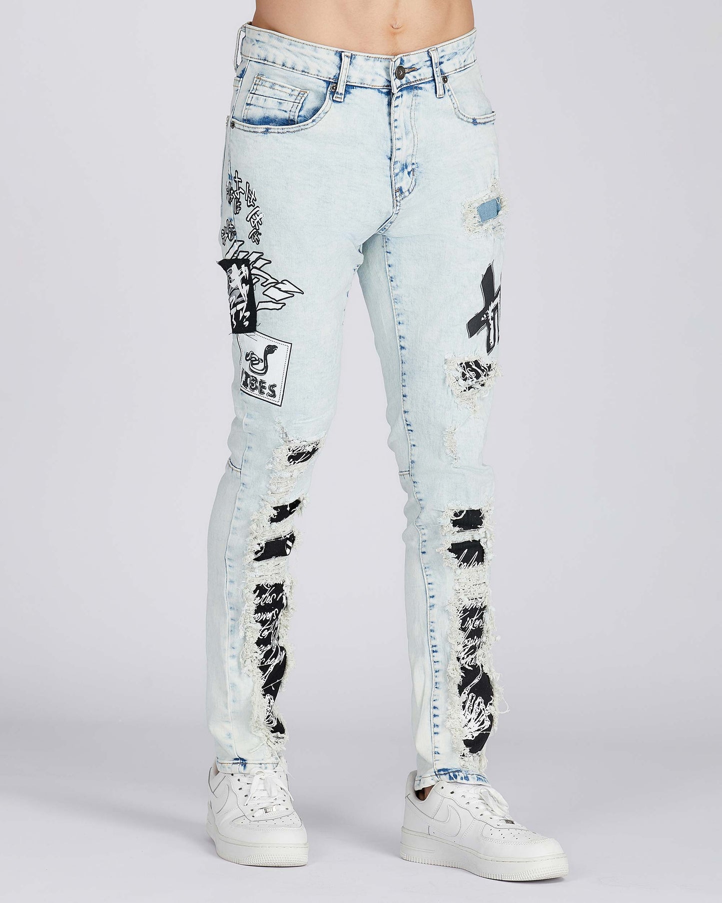 Logeqi distressed blue jeans featuring artistic patches and a trendy ripped design for a stylish look