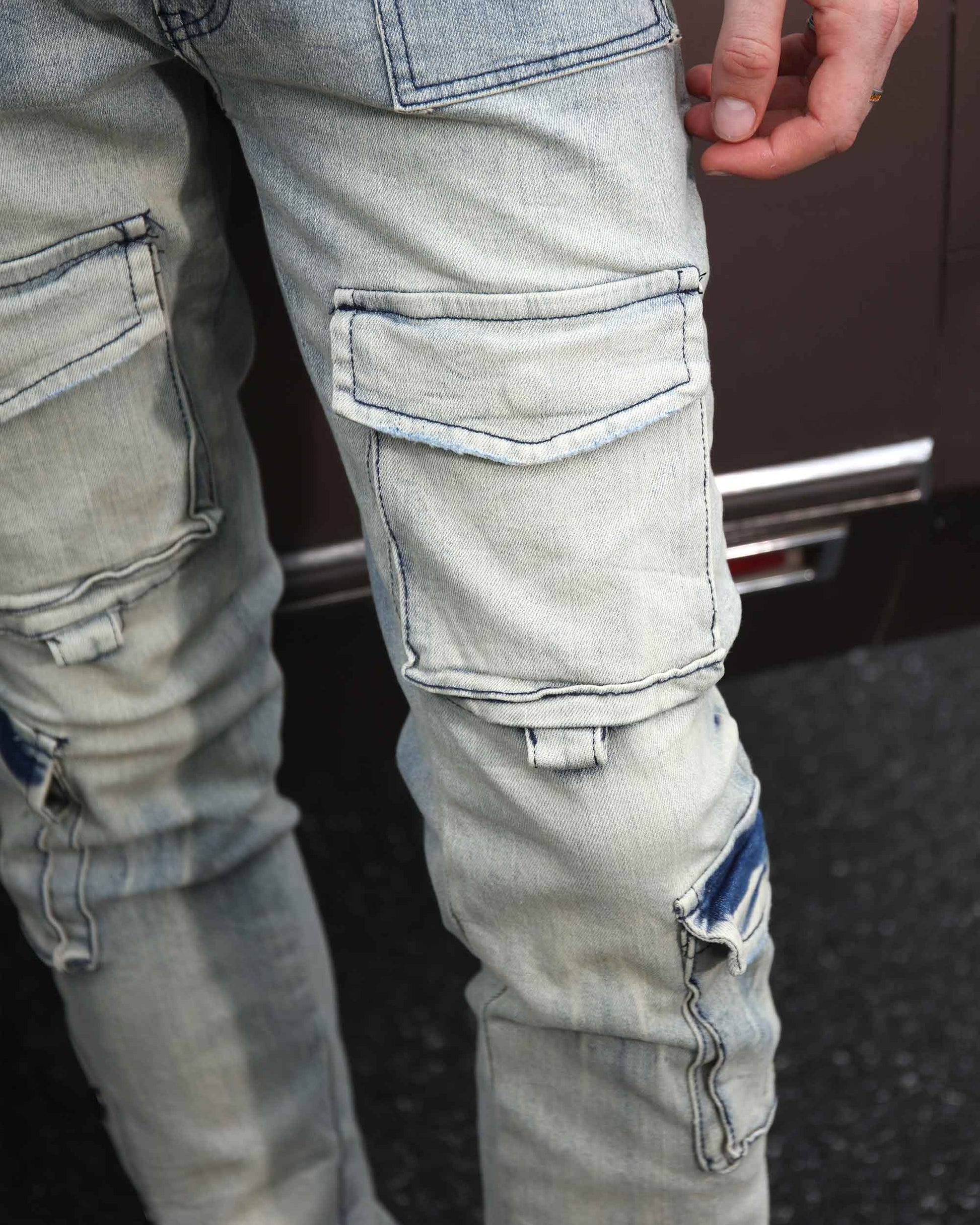 Logeqi distressed cargo jeans men in light wash with multiple pockets and rugged detailing