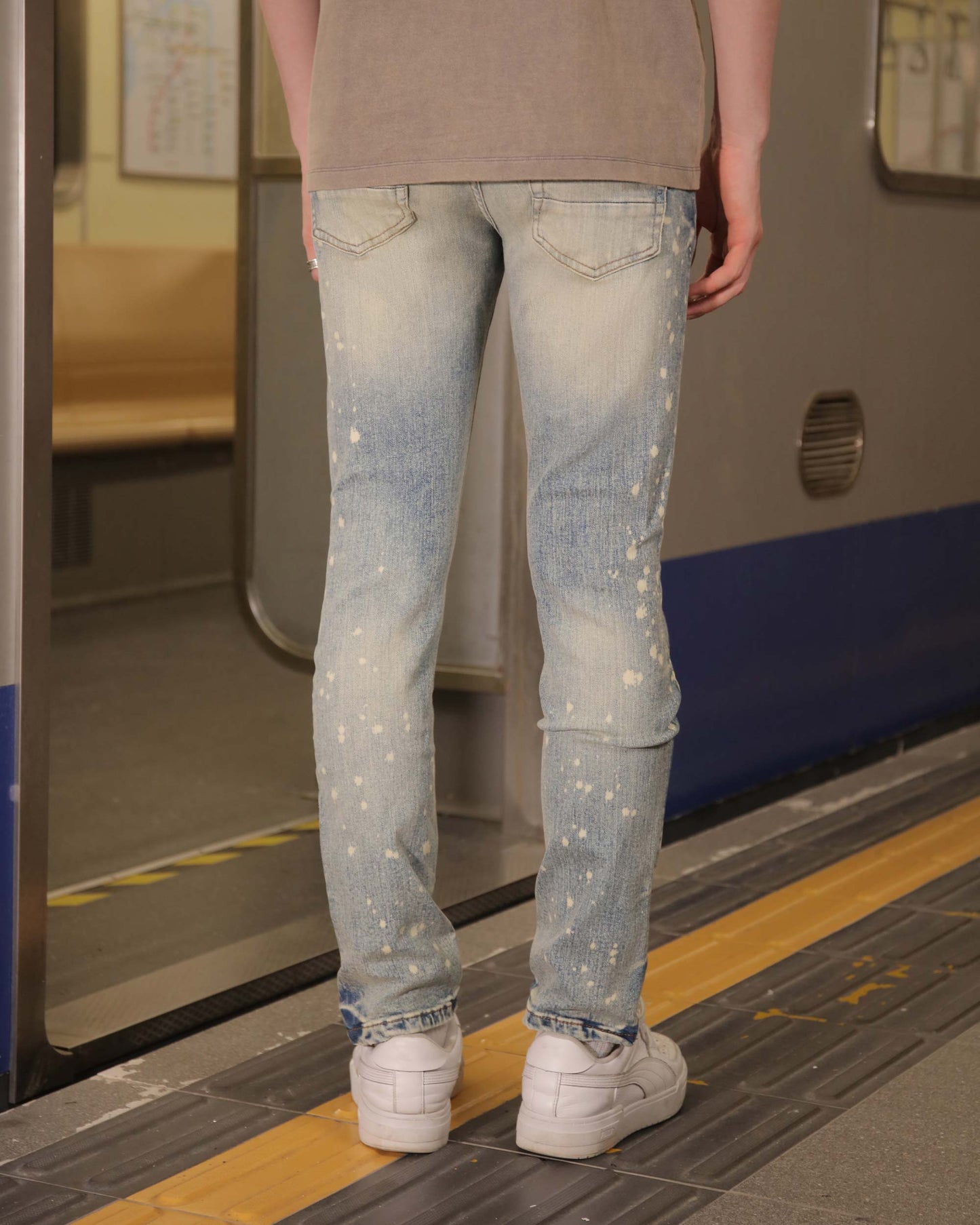 Logeqi distressed whiskered blue jeans featuring a modern fit and stylish faded design
