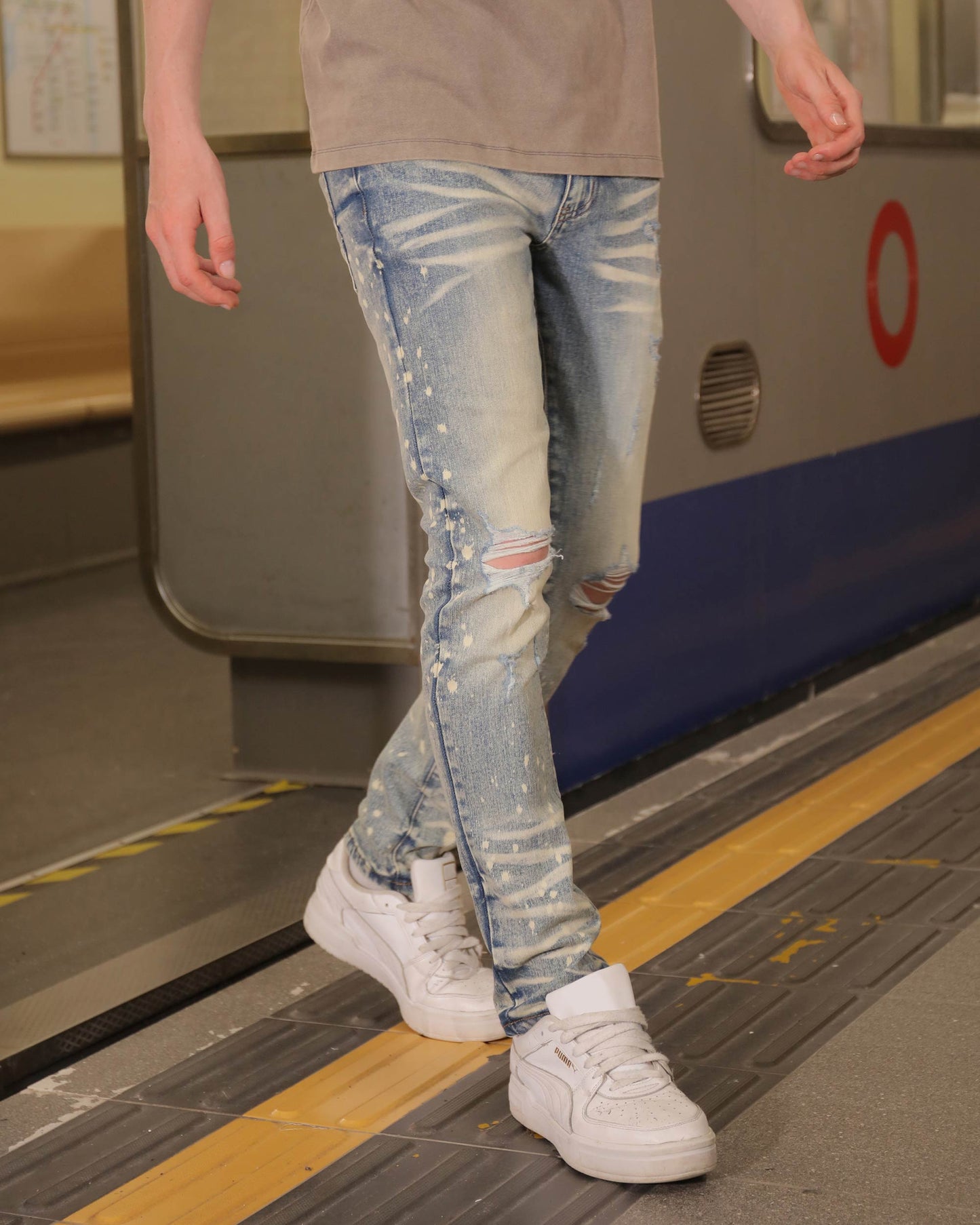 Logeqi distressed whiskered blue jeans with a trendy ripped design for casual styling