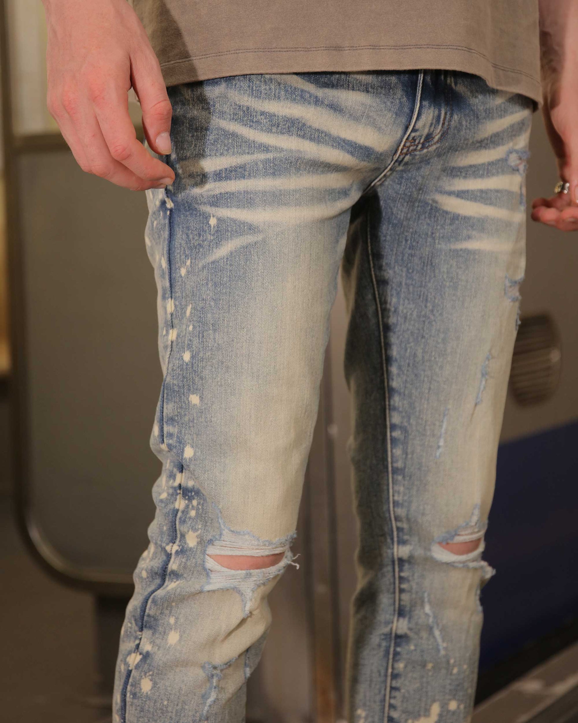 Logeqi distressed whiskered blue jeans with stylish rips and a modern fit
