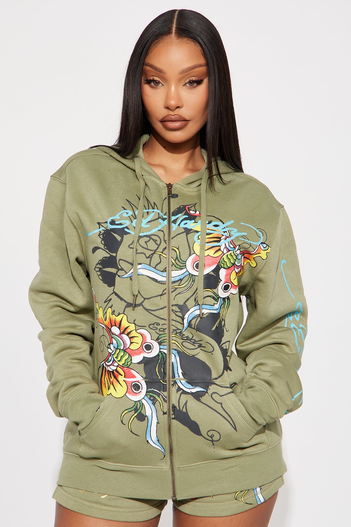 Ed Hardy butterfly hoodie in olive green featuring vibrant floral designs and a zip-up front