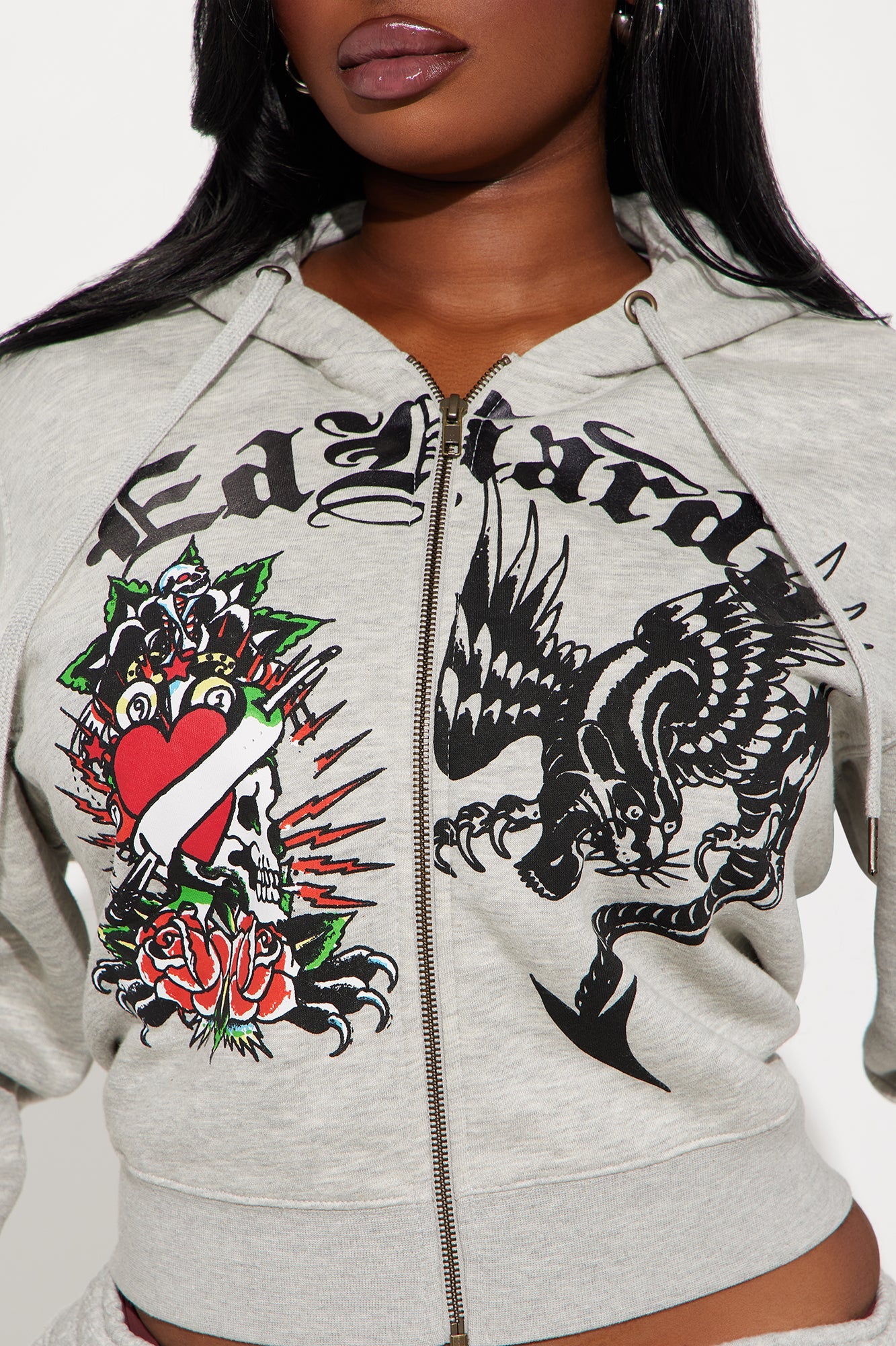 Ed Hardy heart of roses hoodie featuring bold graphics and a stylish zip-up design for trendy looks