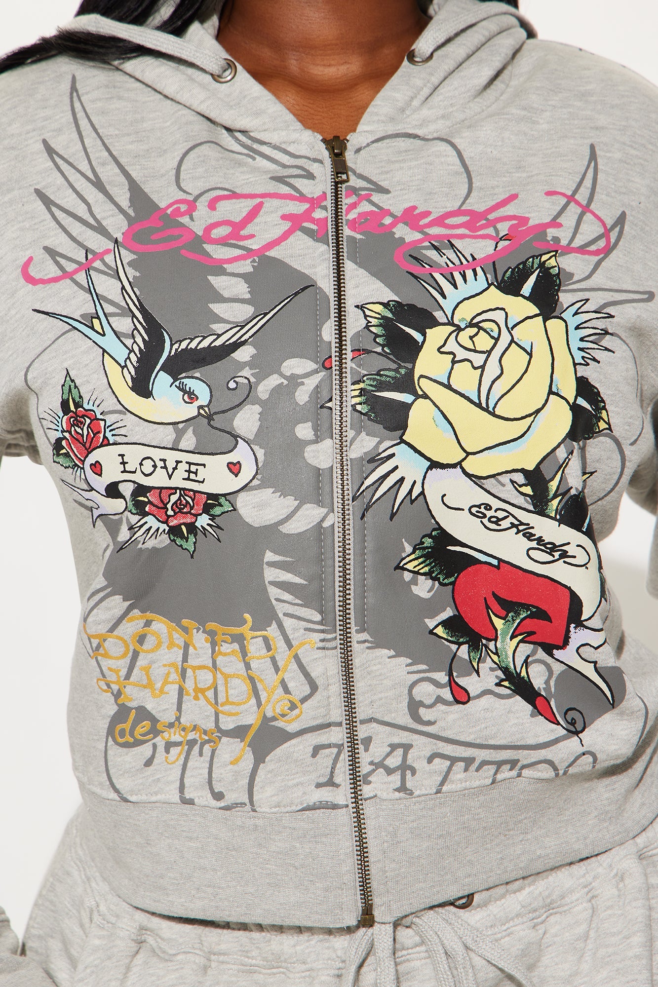 Ed Hardy rose and sword hoodie featuring colorful designs and a zip-up style for trendy casual wear