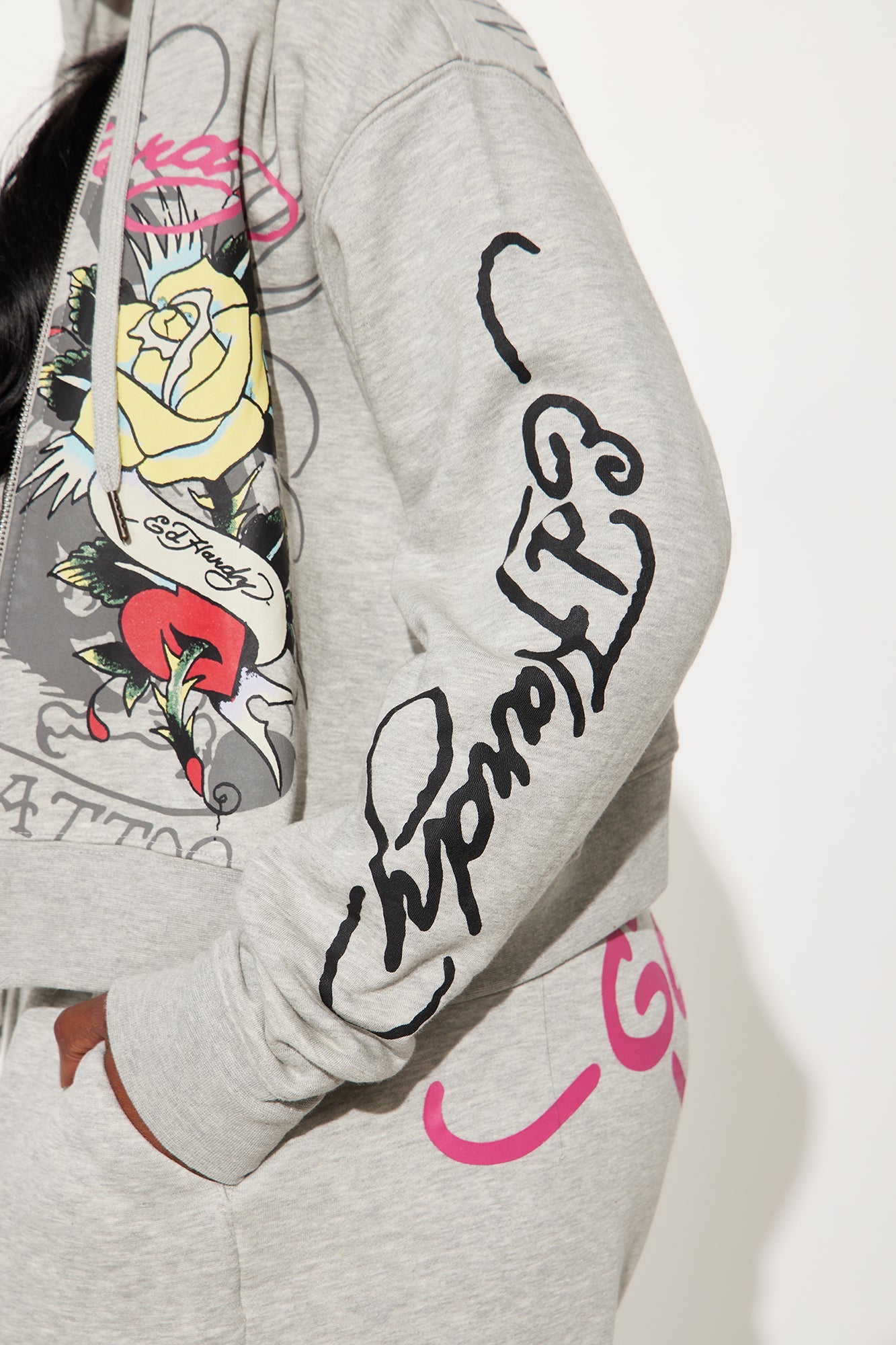 Ed Hardy rose and sword hoodie in gray featuring vibrant graphics and stylish design details